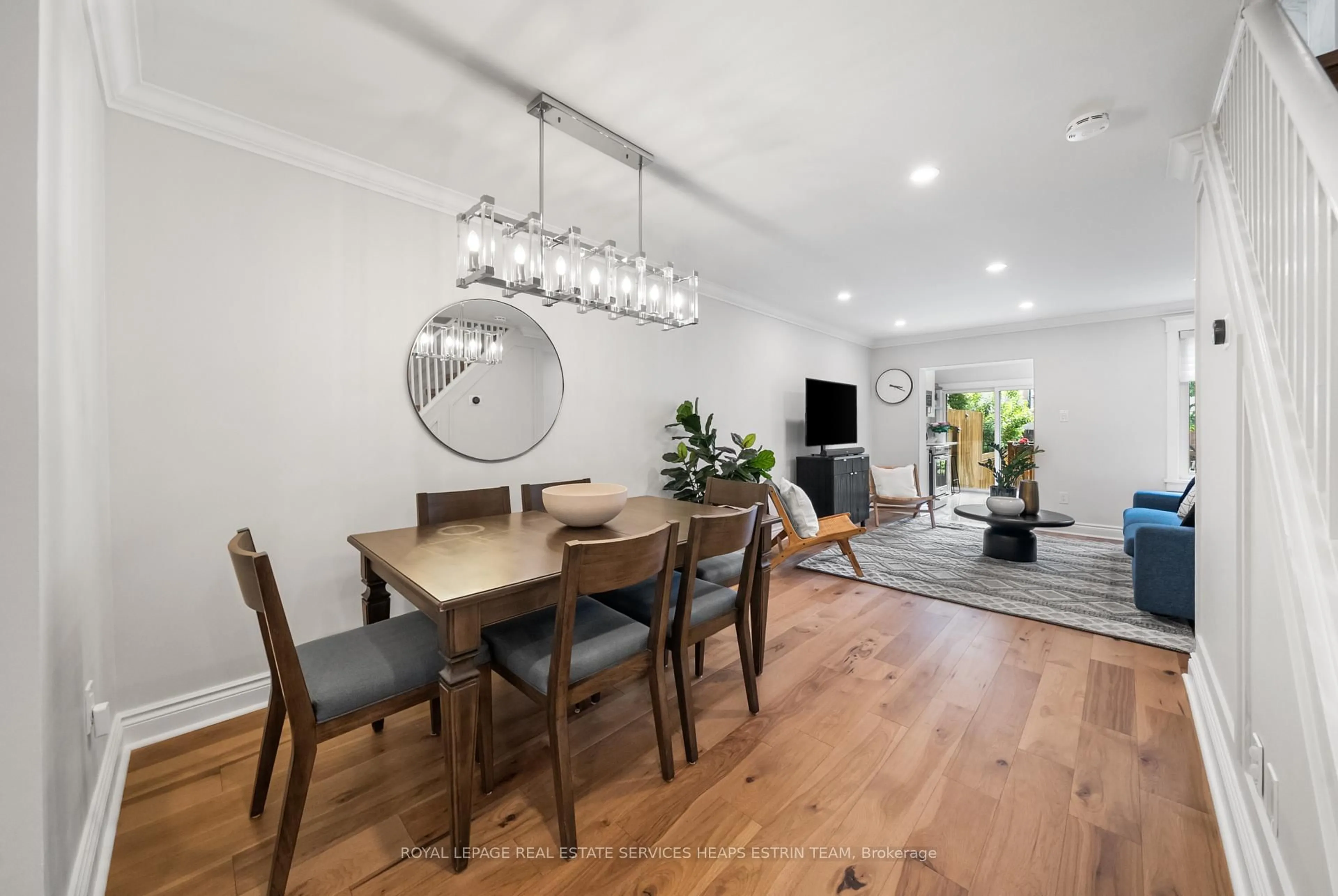 Dining room, wood/laminate floor for 18 Alton Ave, Toronto Ontario M4L 2M2