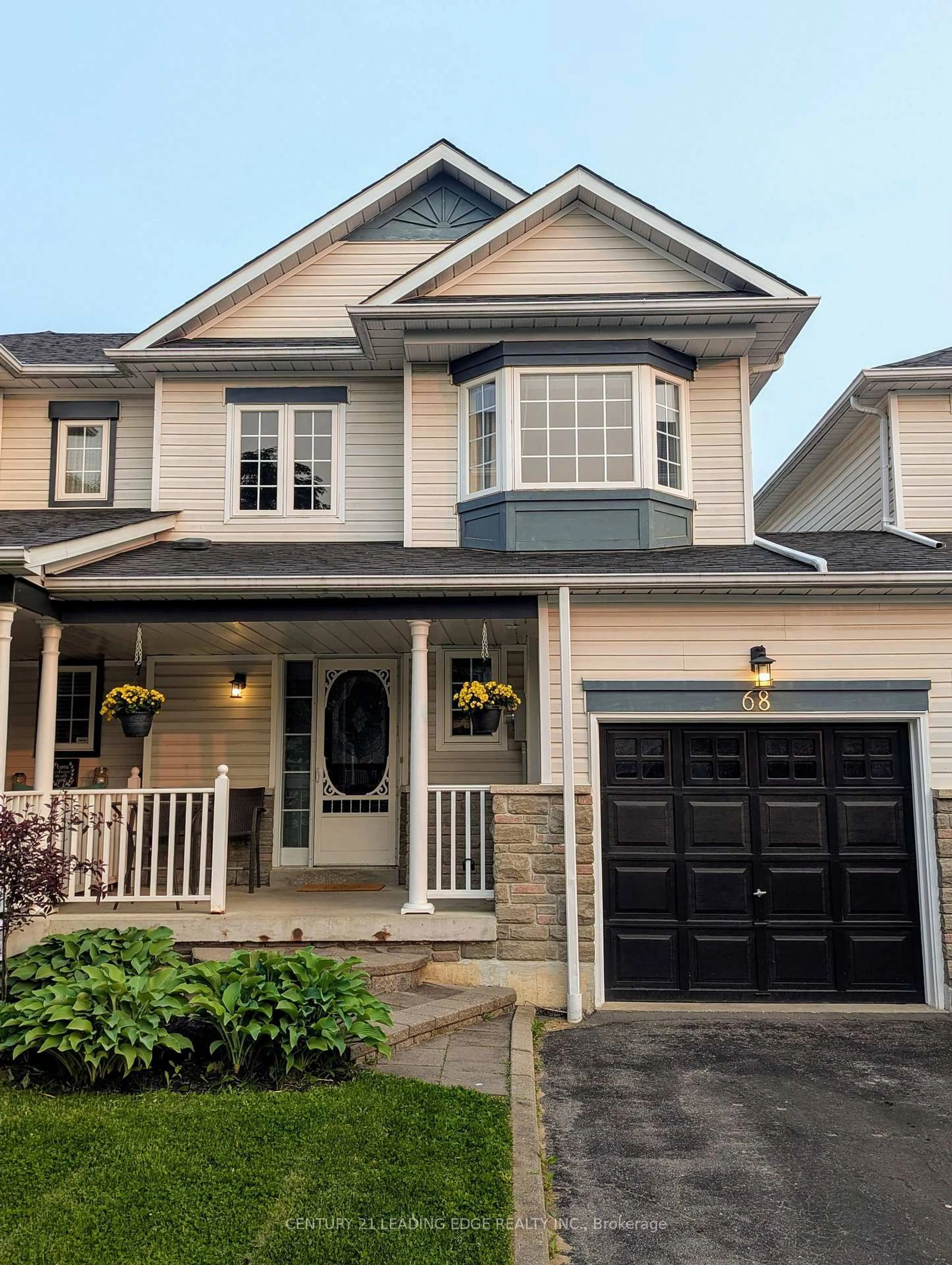 Home with vinyl exterior material, street for 68 Melody Dr, Whitby Ontario L1M 1K2