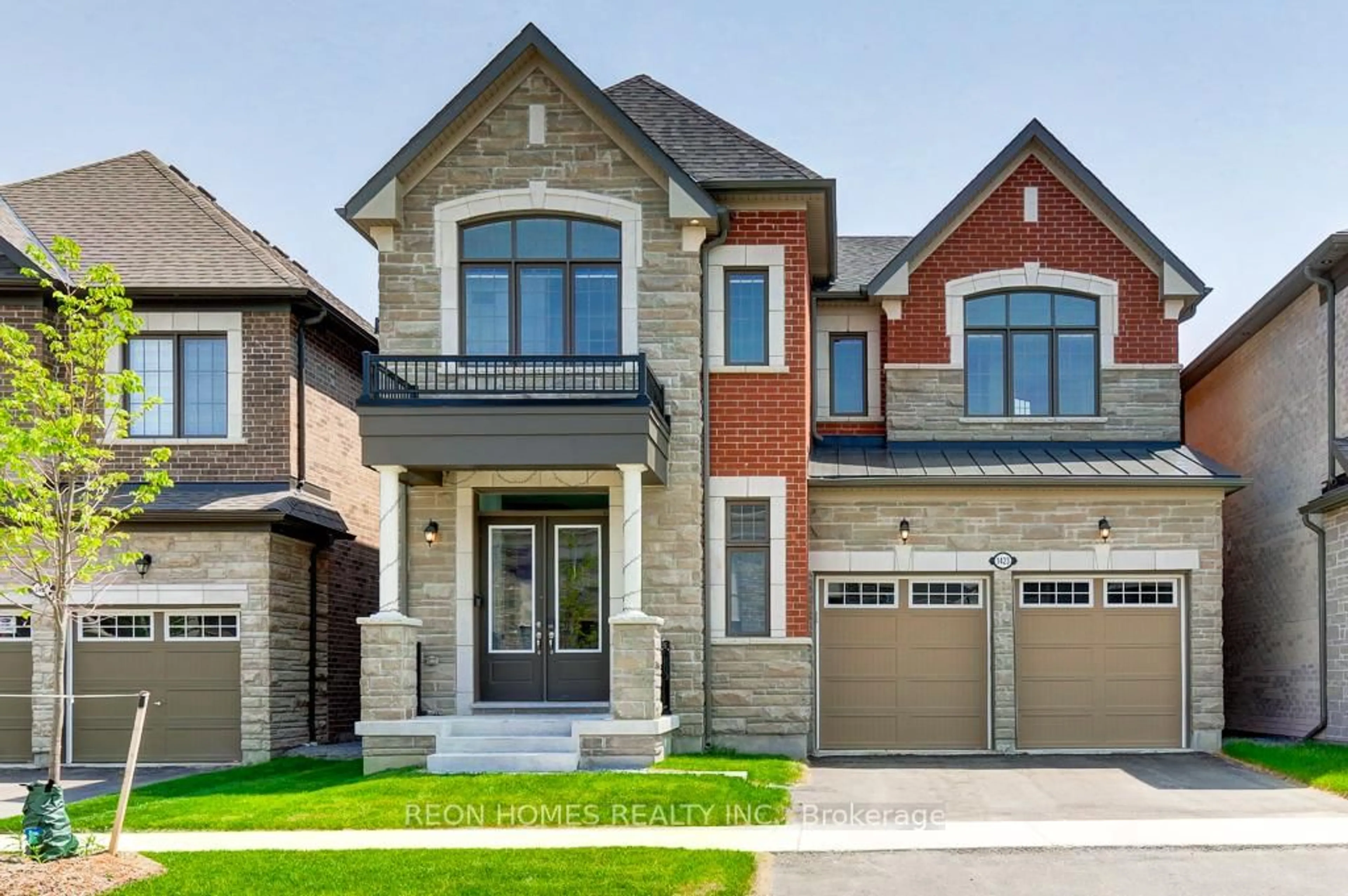 Home with brick exterior material, street for 1423 Swallowtail Lane, Pickering Ontario L1X 0N8