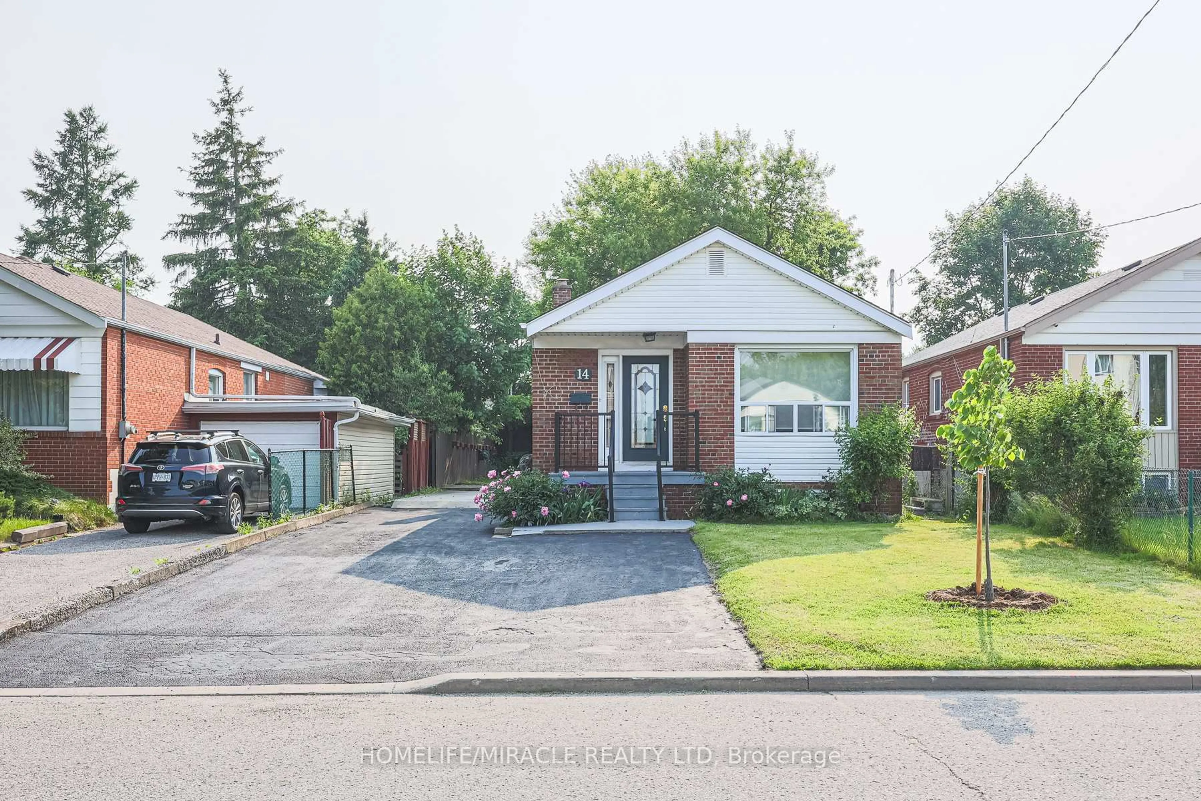 Home with brick exterior material, street for 14 Frey Cres, Toronto Ontario M1R 2C4