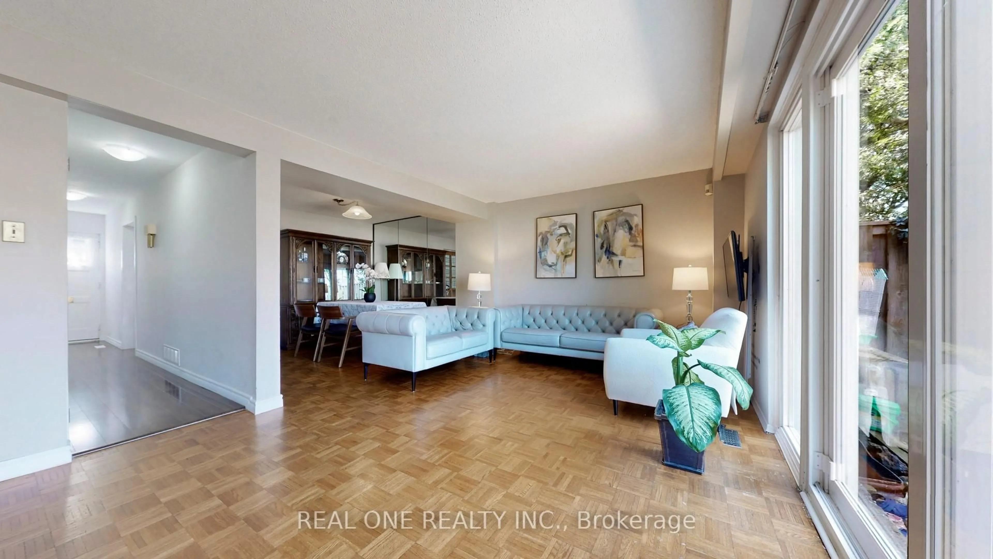 Living room with furniture, ceramic/tile floor for 54 Bonis Ave, Toronto Ontario M1T 2V1