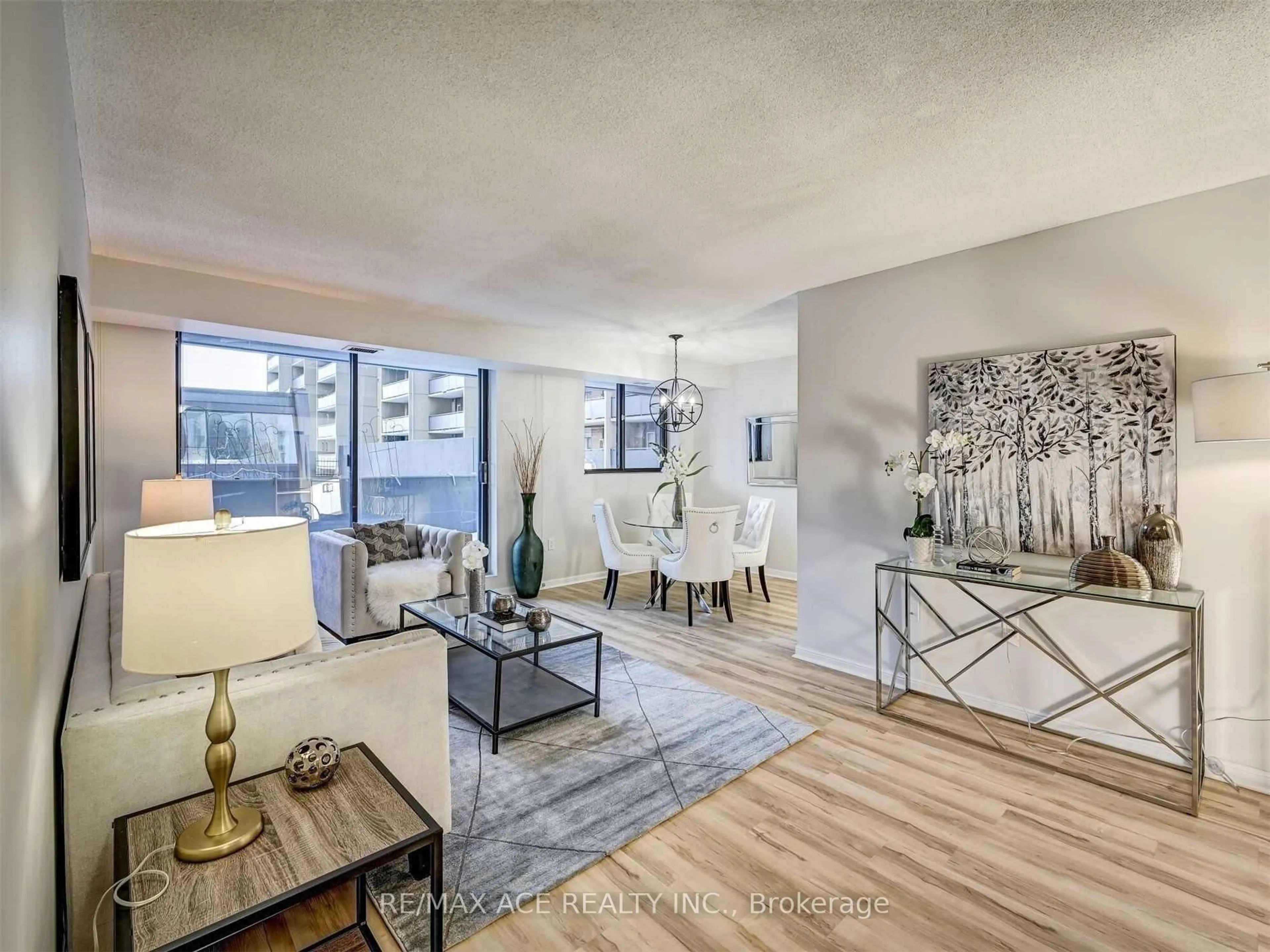 Living room with furniture, unknown for 757 Victoria Park Ave #207, Toronto Ontario M4C 5N8