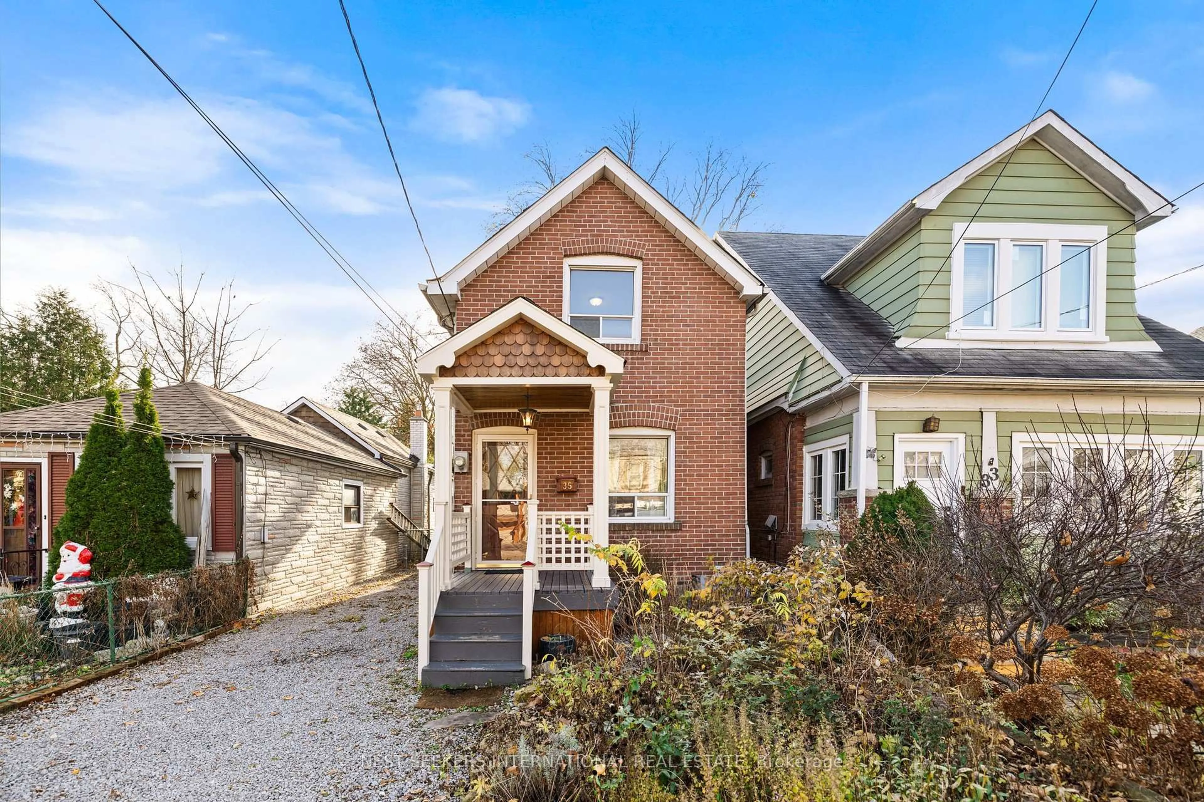 Home with brick exterior material, street for 35 Cambrai Ave, Toronto Ontario M4C 2P7