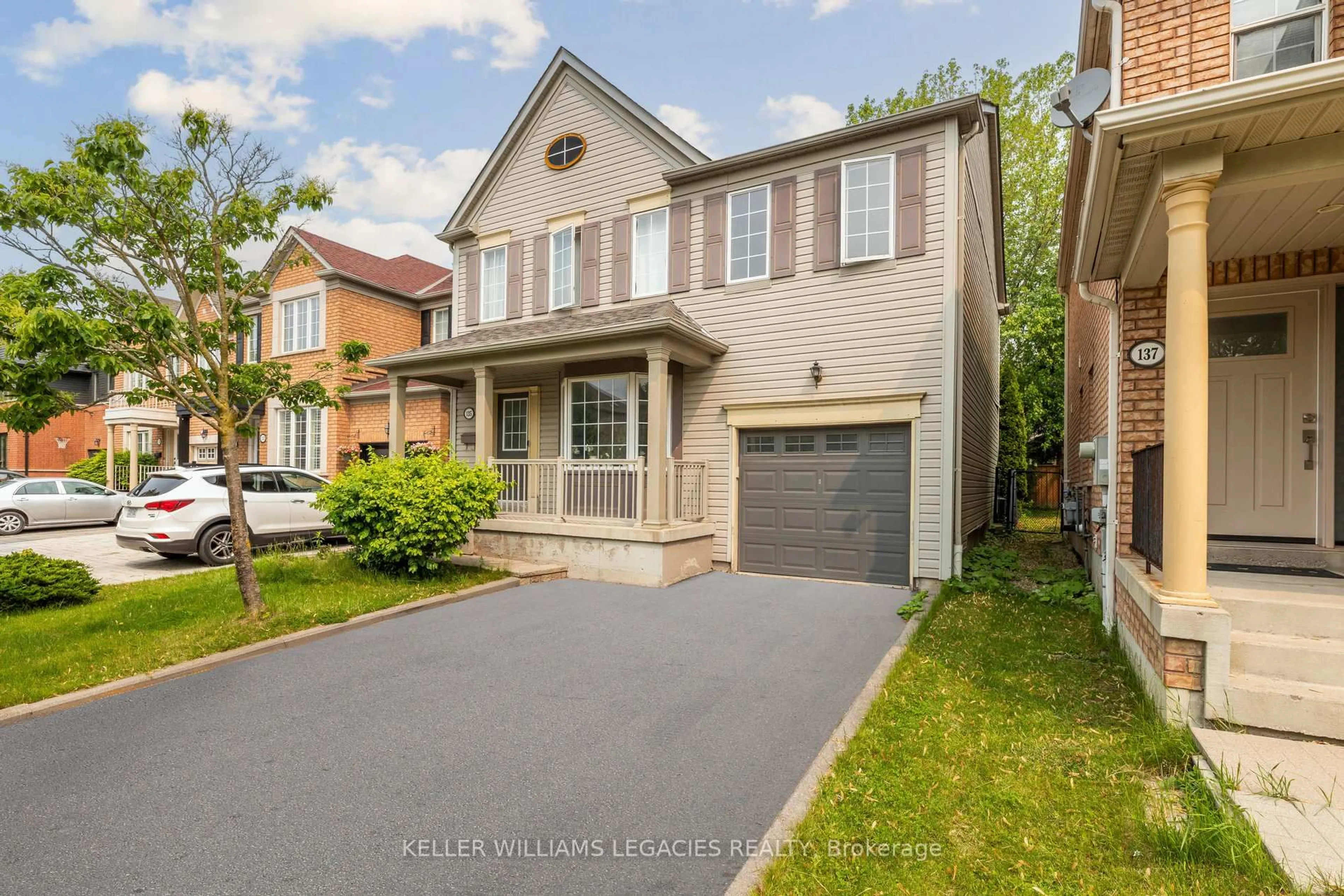 Home with brick exterior material, street for 135 Mcsweeney Cres, Ajax Ontario L1T 4C8