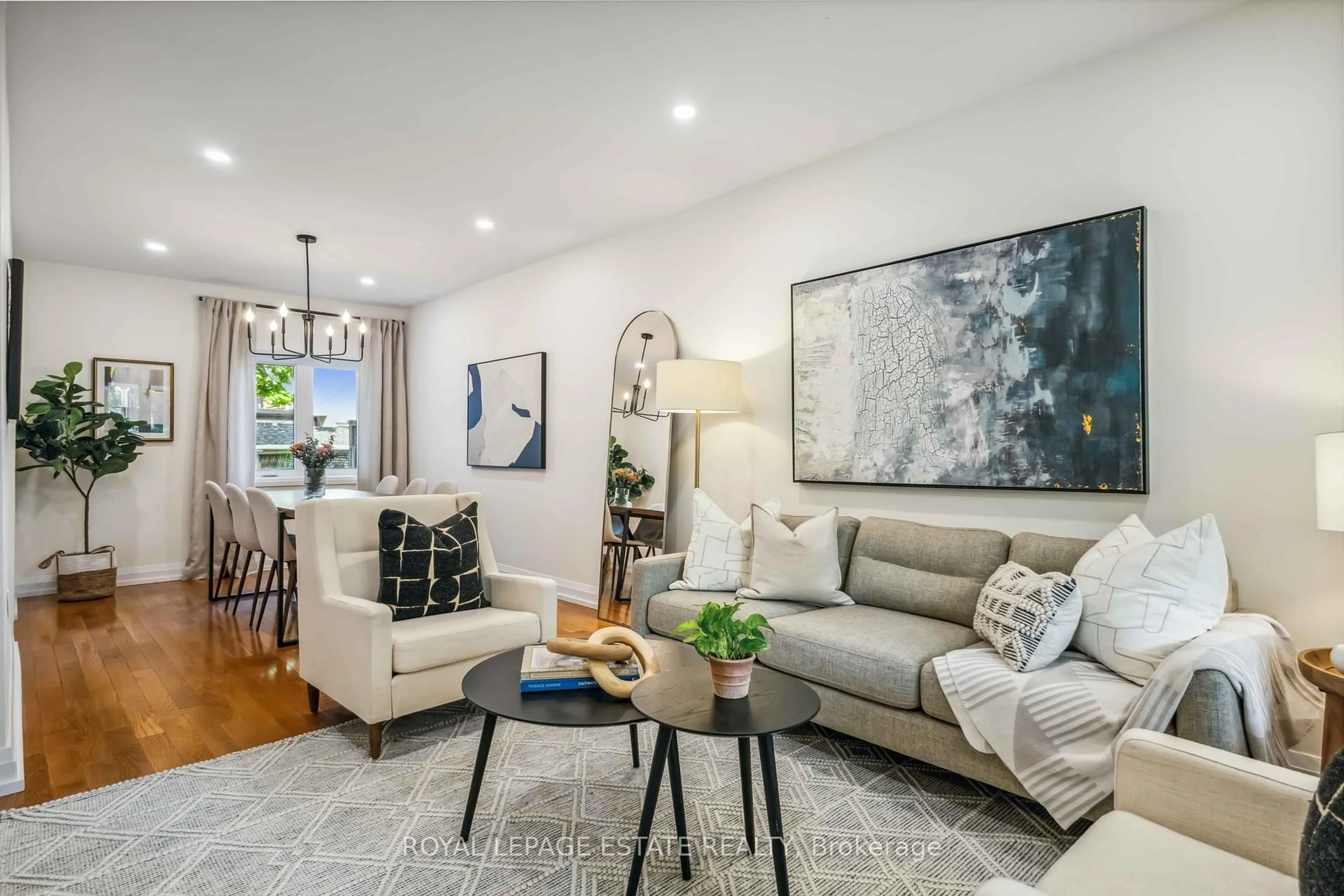 Living room with furniture, unknown for 166 Bingham Ave, Toronto Ontario M4E 3R3