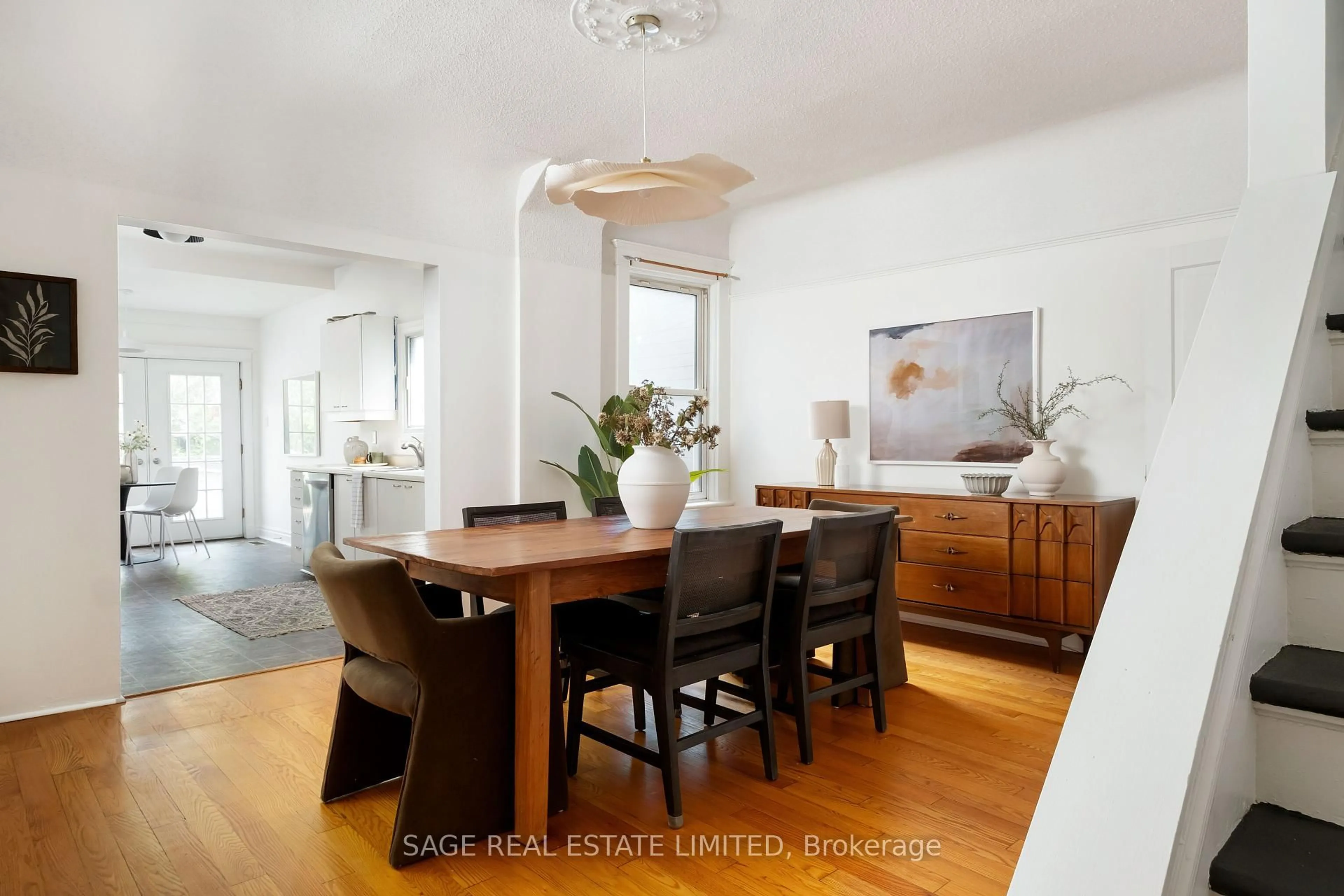 Dining room, wood/laminate floor for 120 Withrow Ave, Toronto Ontario M4K 1C9
