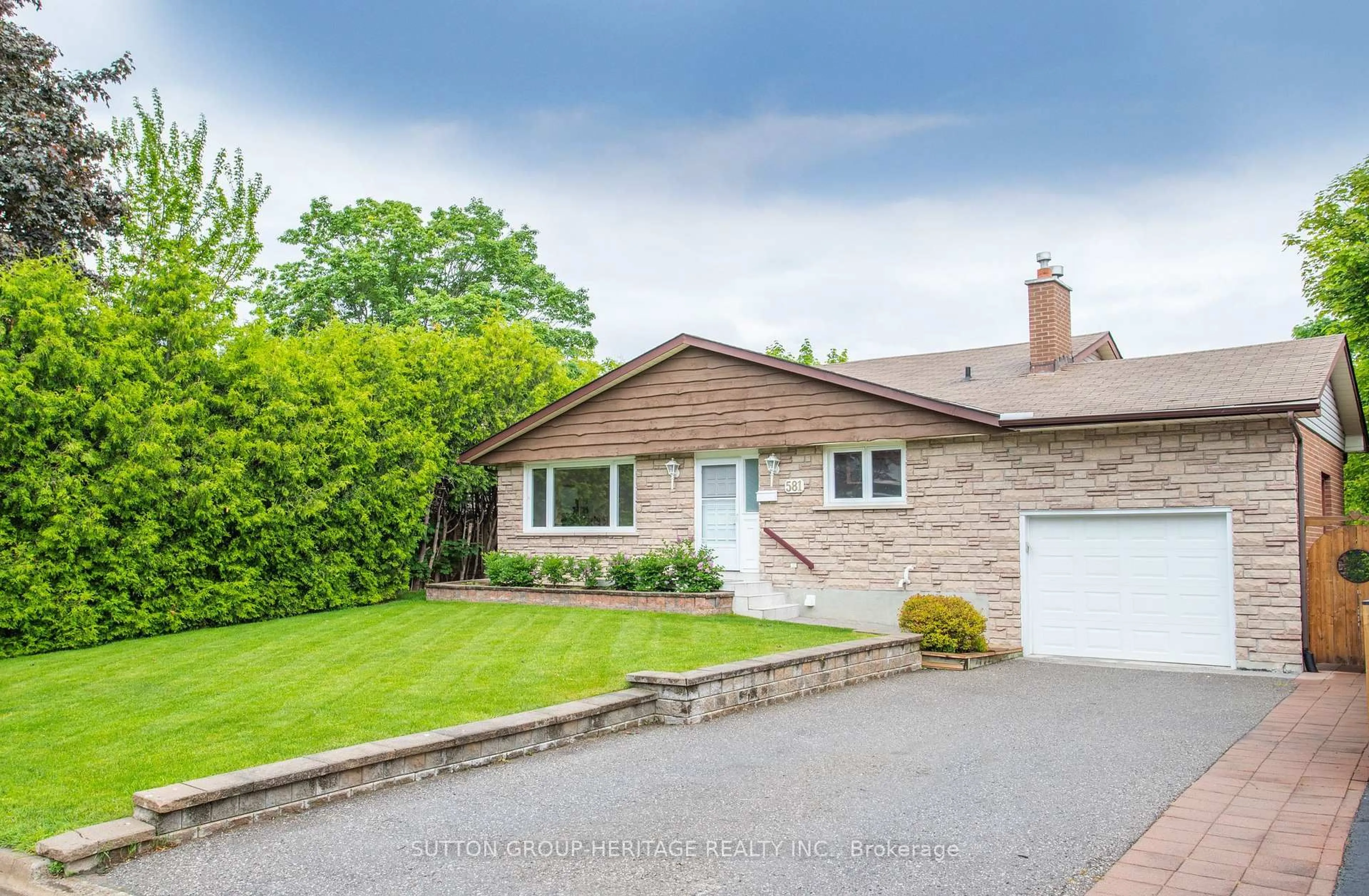 Home with brick exterior material, street for 581 Arnhem Dr, Oshawa Ontario L1G 2J7