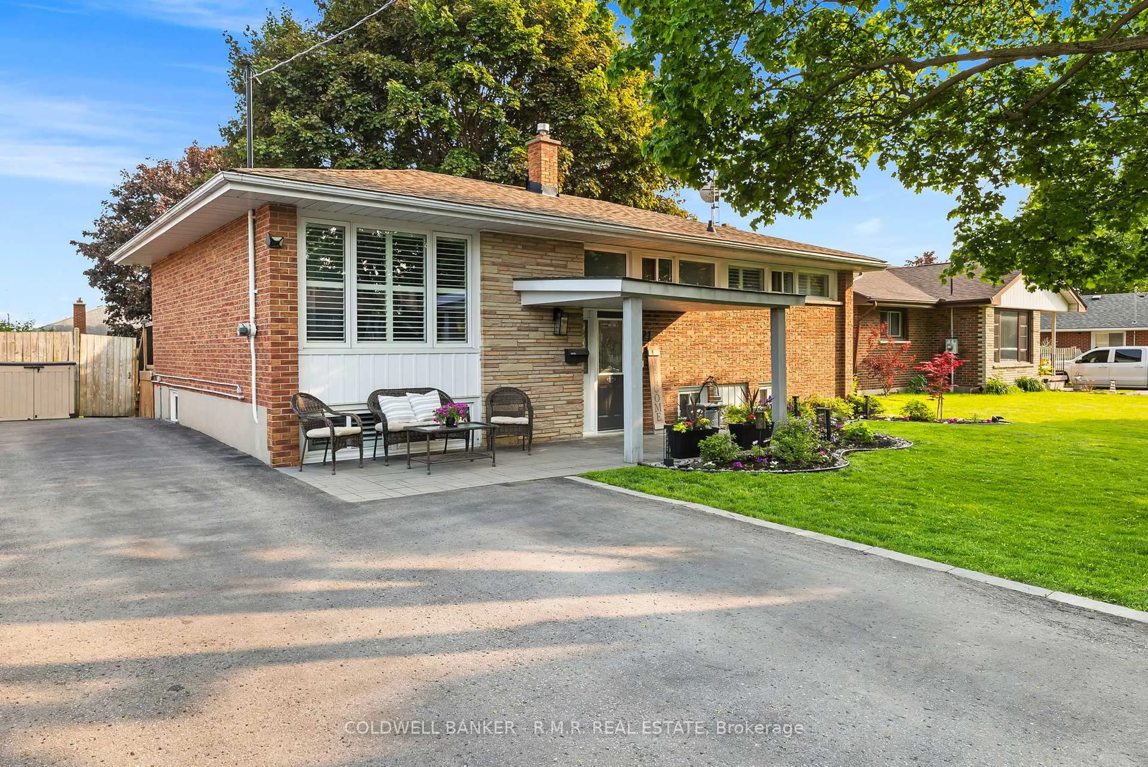 Home with brick exterior material, street for 21 Parkway Cres, Clarington Ontario L1C 1B9