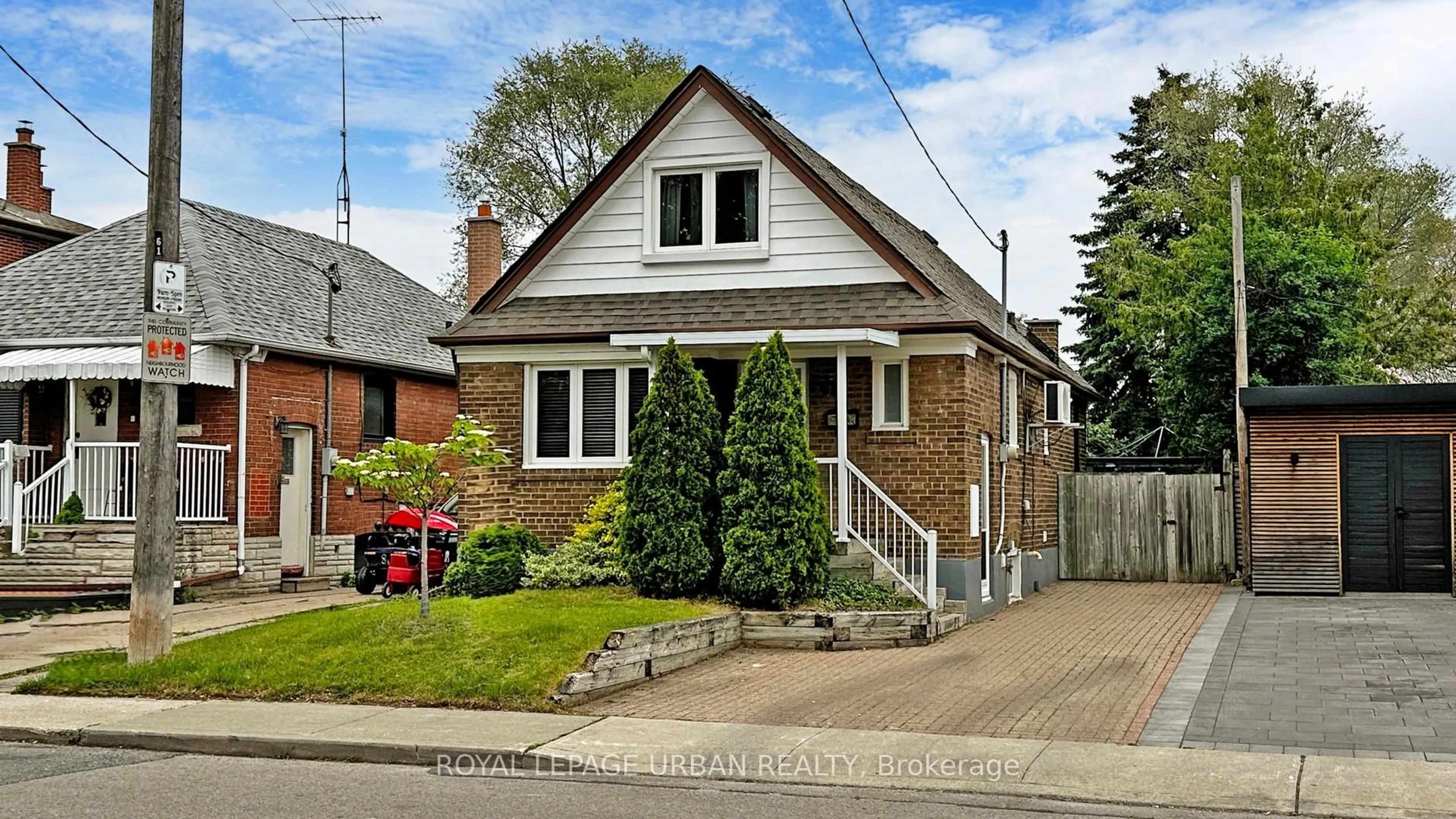 Home with brick exterior material, street for 61 Binswood Ave, Toronto Ontario M4C 3N8