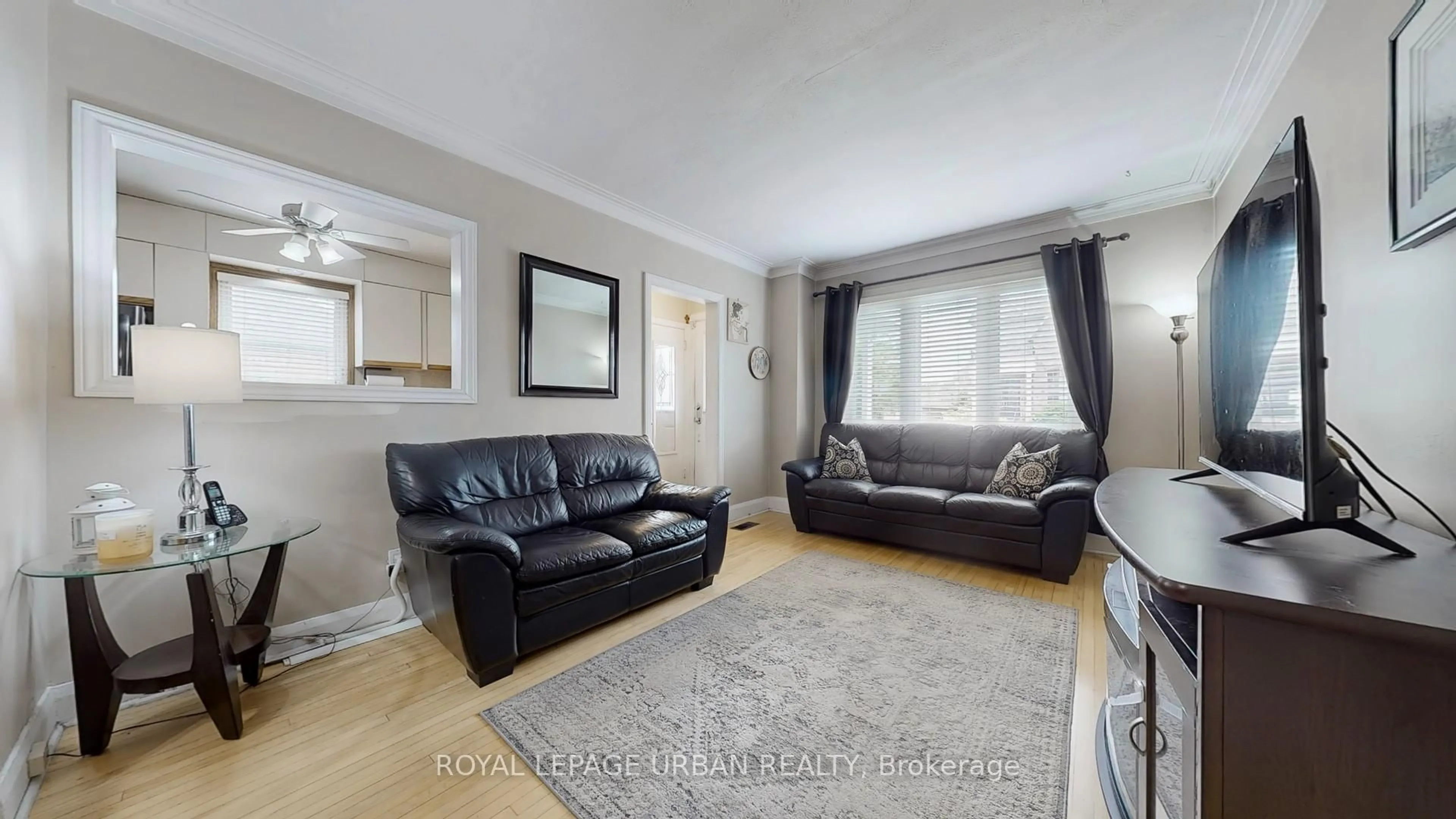 Living room with furniture, unknown for 61 Binswood Ave, Toronto Ontario M4C 3N8