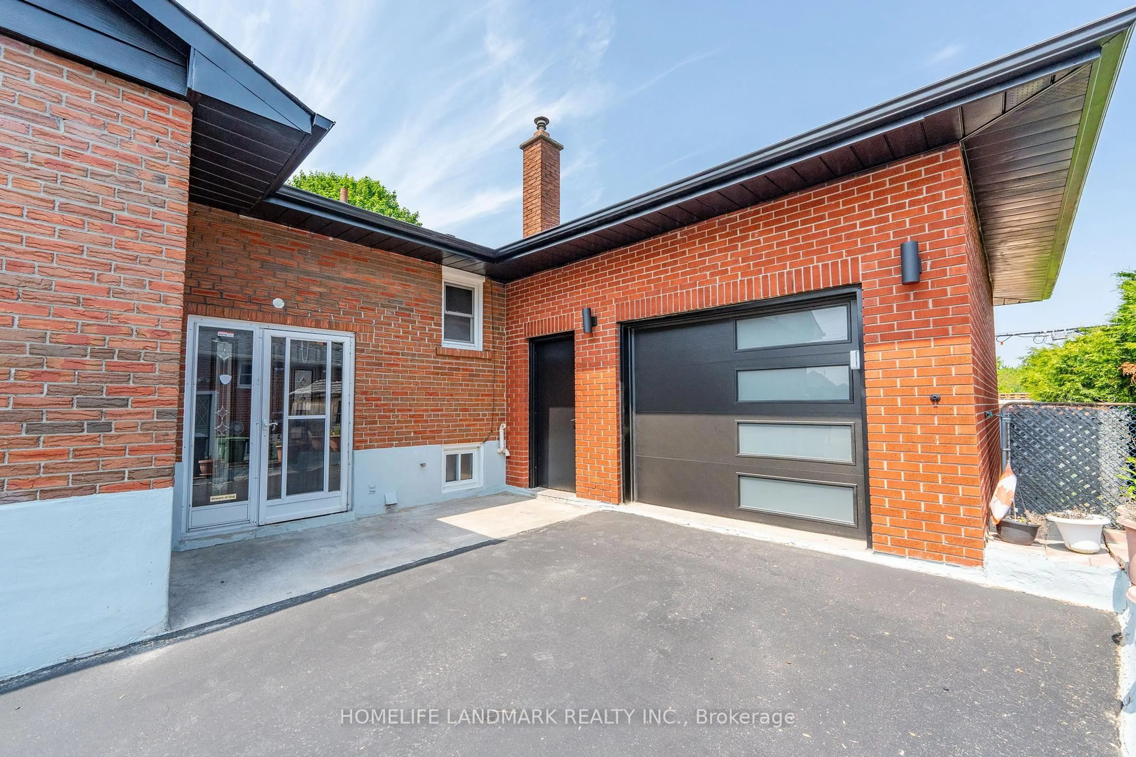 Home with brick exterior material, street for 102 Jarwick Dr, Toronto Ontario M1H 2H4
