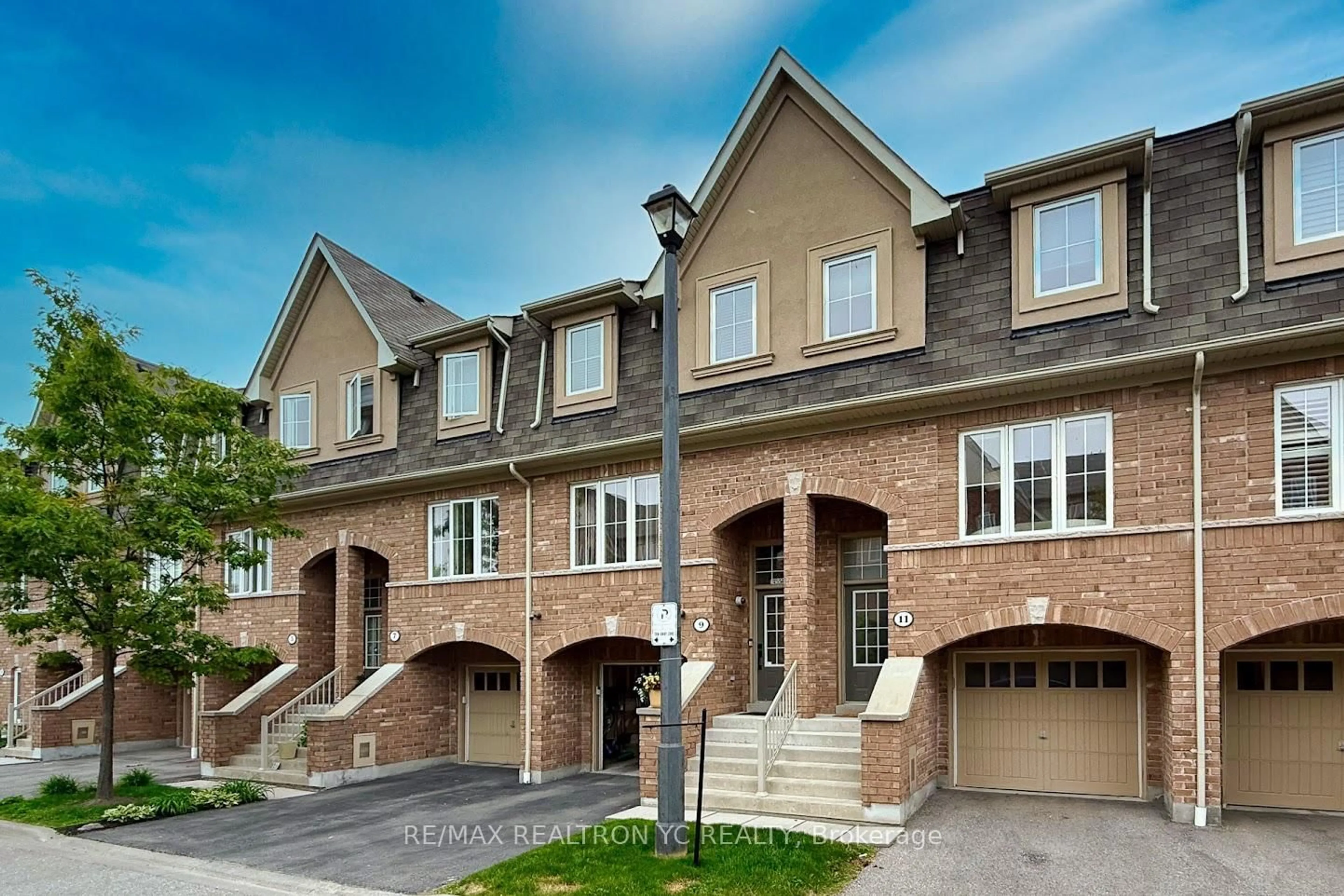 Home with brick exterior material, street for 11 Reevesmere Lane, Ajax Ontario L1Z 0L3