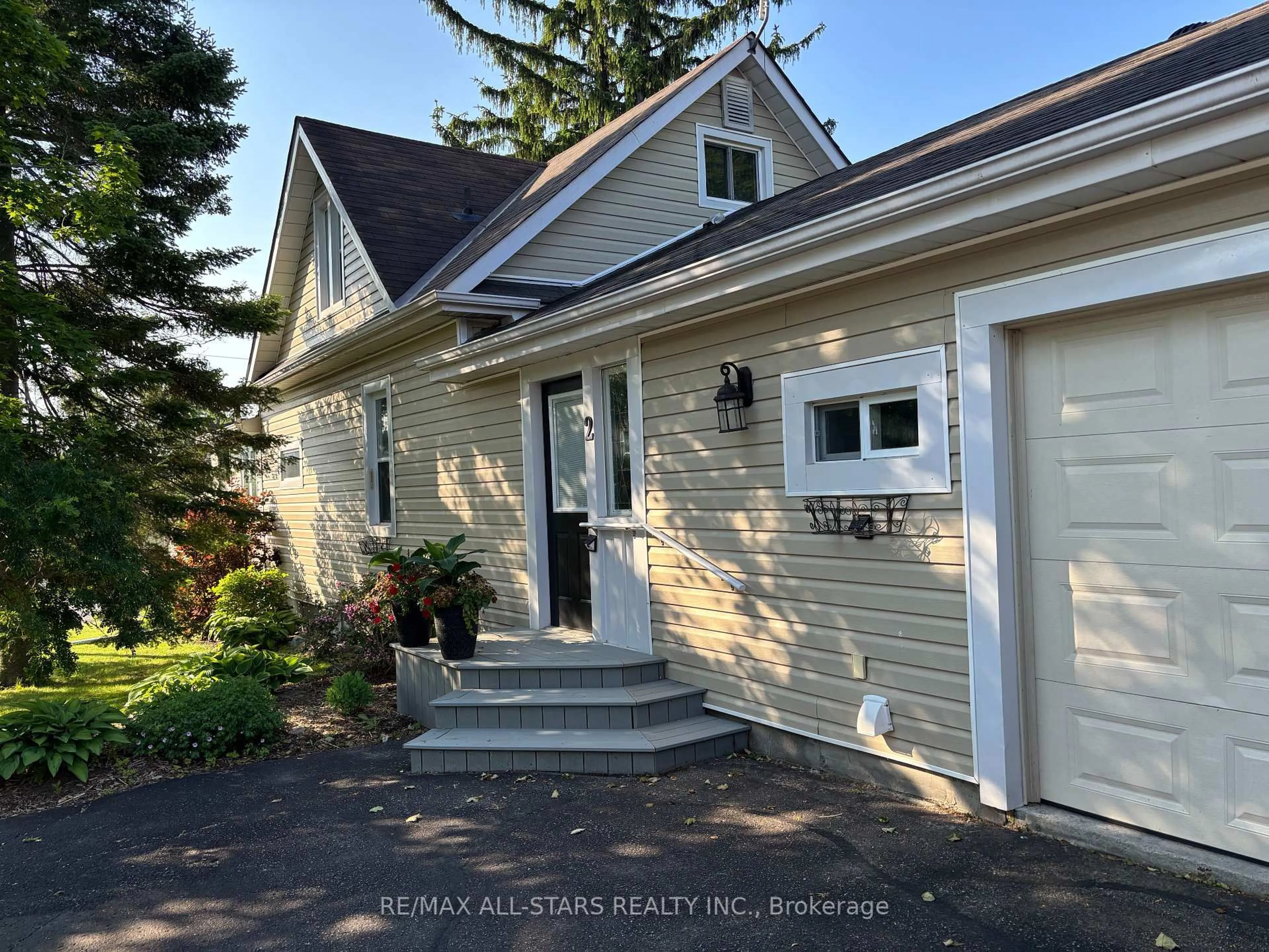 Home with vinyl exterior material, street for 2 Henrietta St, Scugog Ontario L0C 1G0