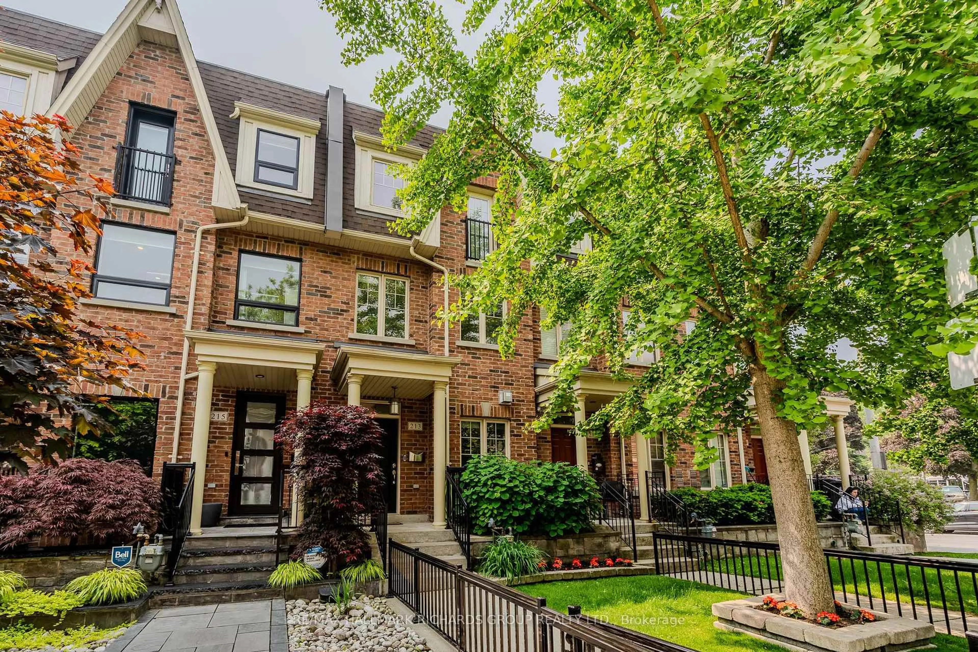 Home with brick exterior material, street for 213 First Ave, Toronto Ontario M4M 1X5