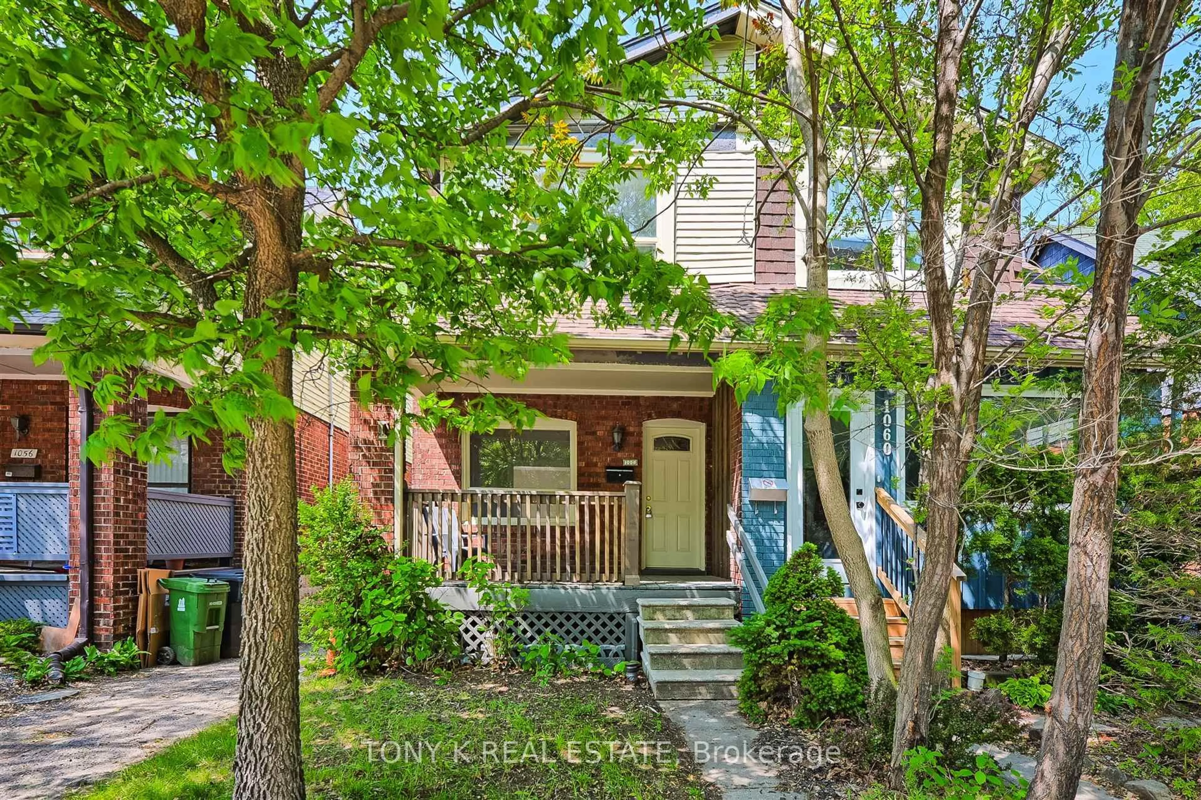 Home with brick exterior material, street for 1058 Woodbine Ave, Toronto Ontario M4C 4C5