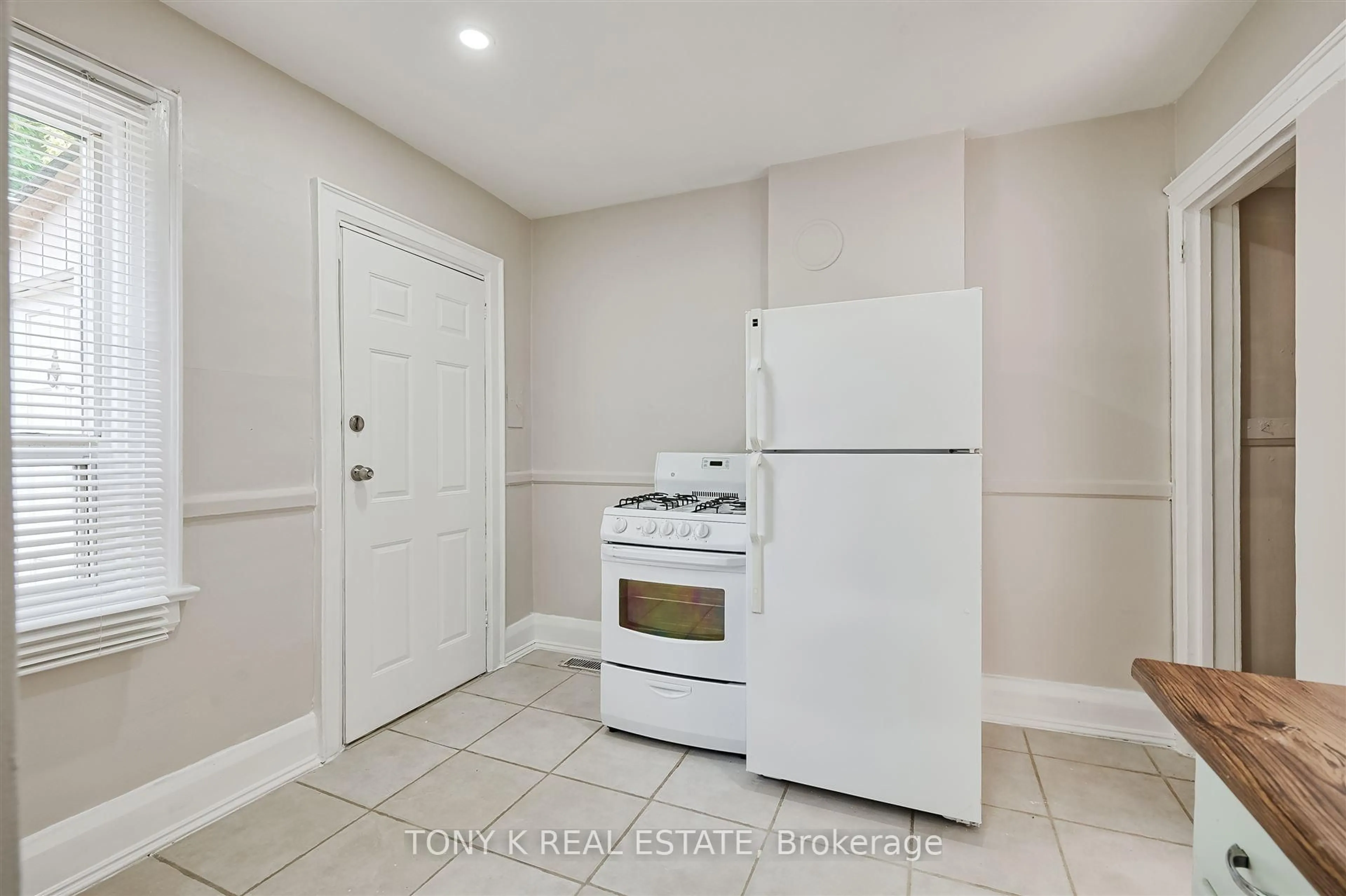 Standard kitchen, ceramic/tile floor for 1058 Woodbine Ave, Toronto Ontario M4C 4C5
