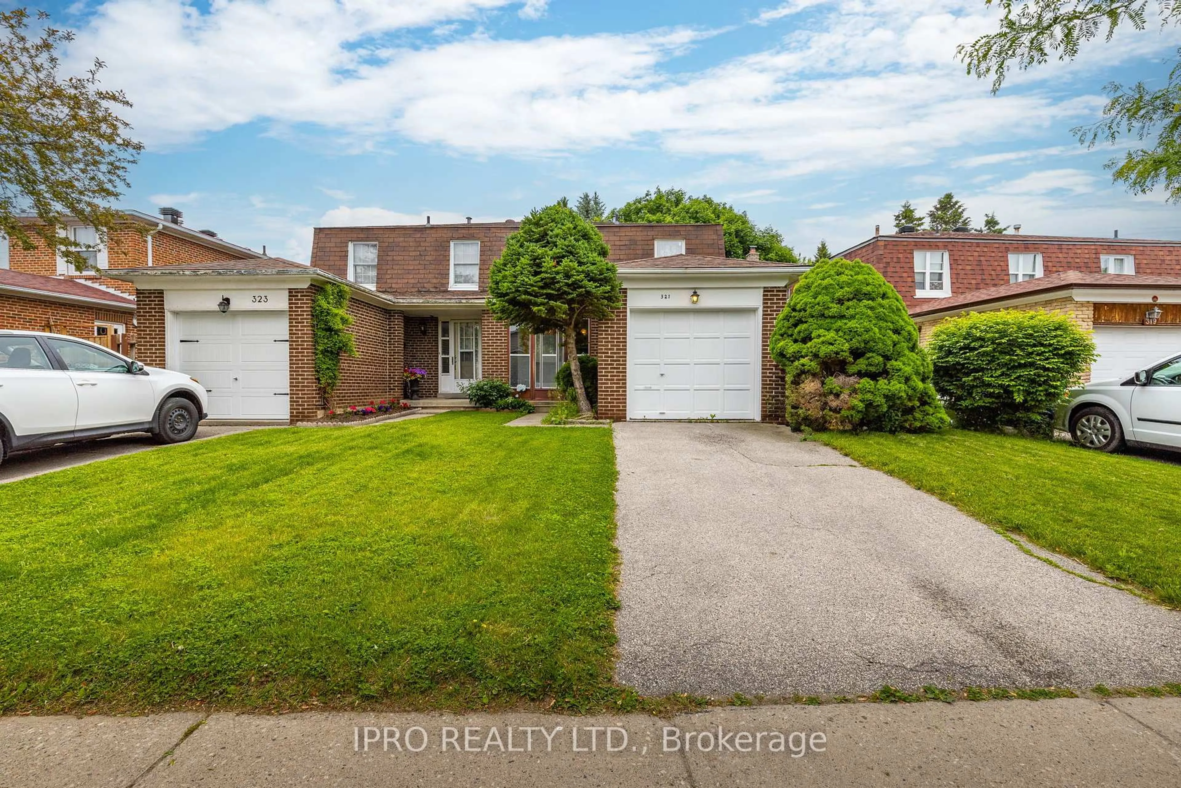 Home with brick exterior material, street for 321 Chartland Blvd, Toronto Ontario M1S 3P4