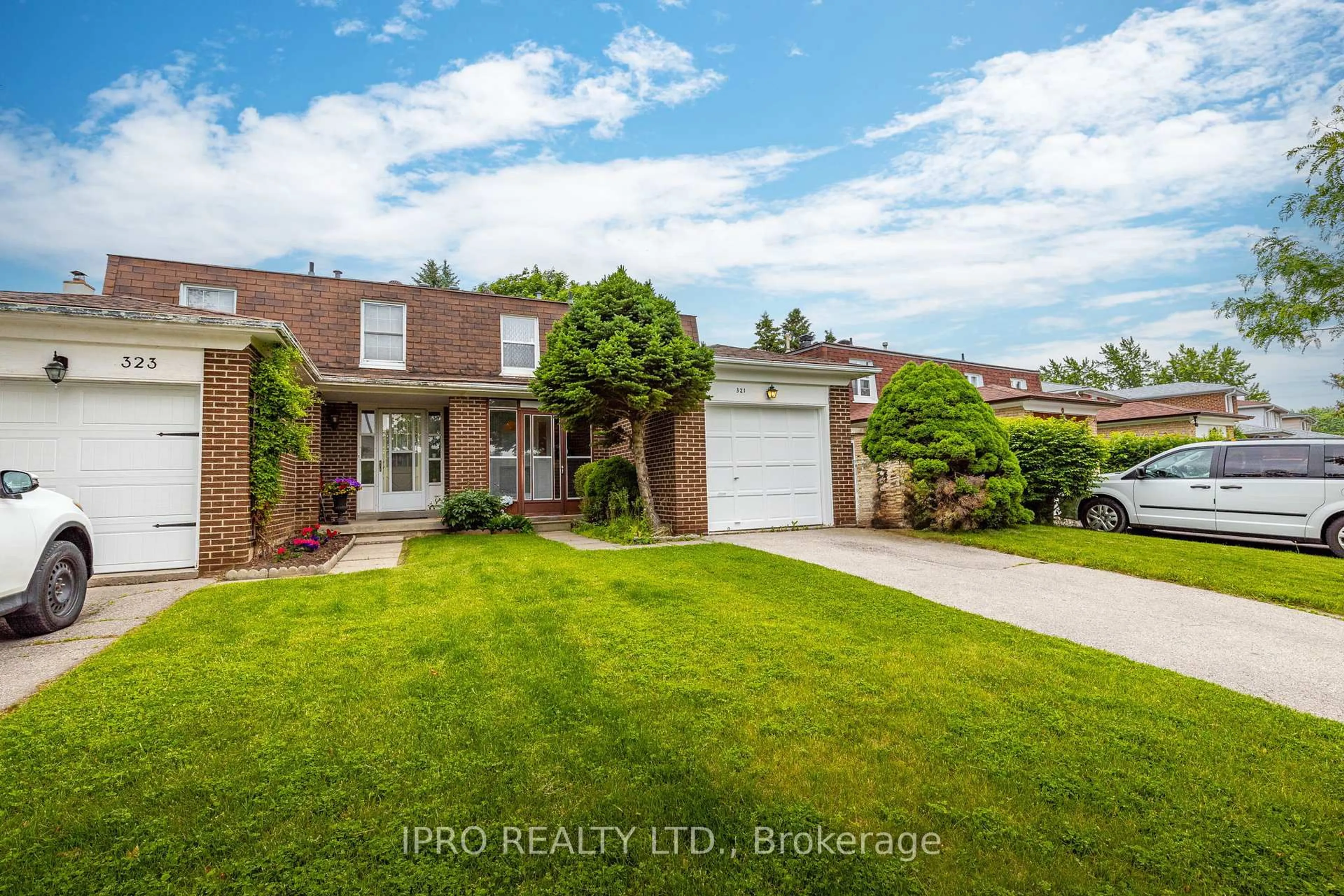 Home with brick exterior material, street for 321 Chartland Blvd, Toronto Ontario M1S 3P4