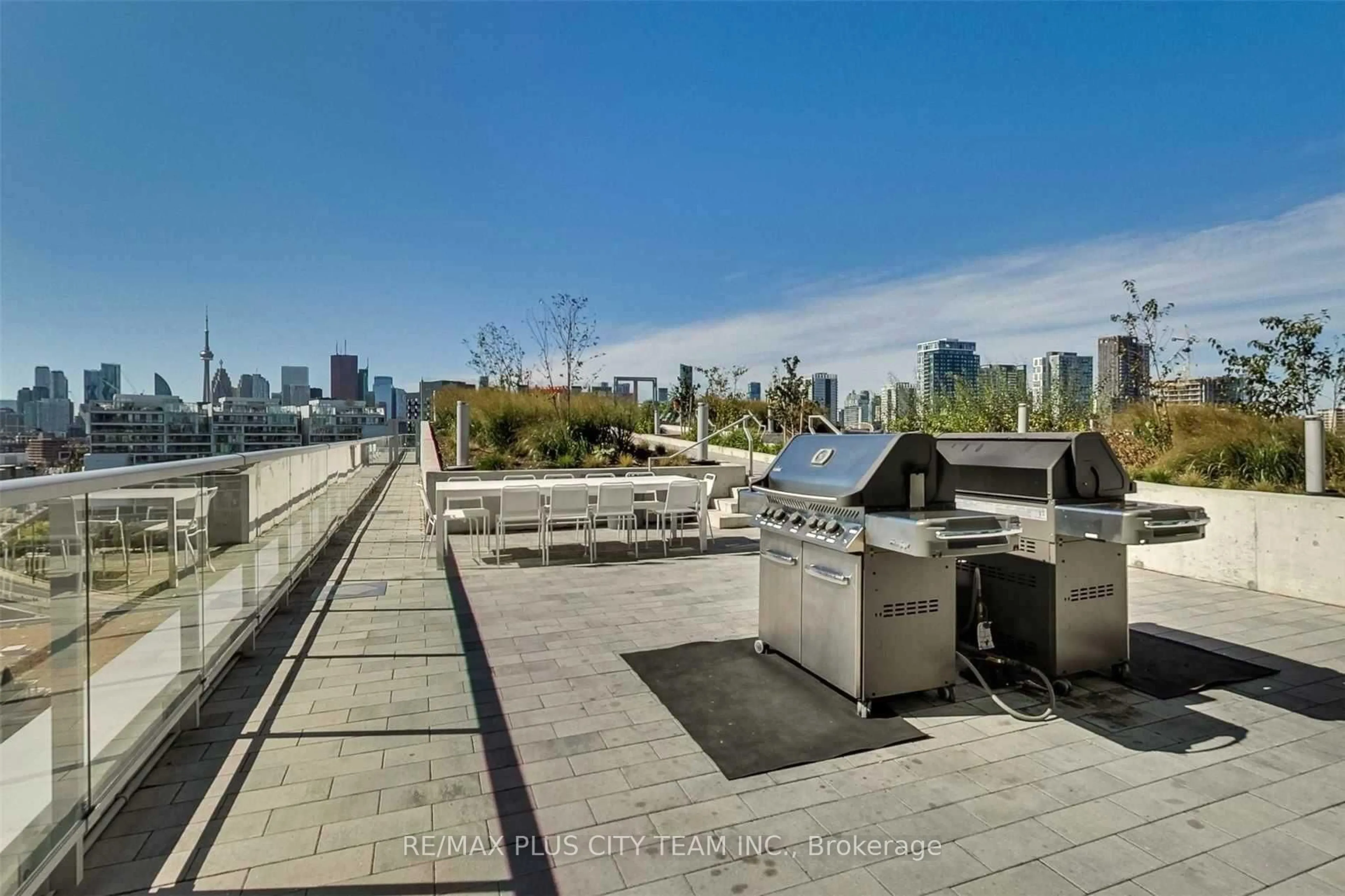 Patio, city buildings view from balcony for 15 Baseball Pl #1511, Toronto Ontario M4M 0E6