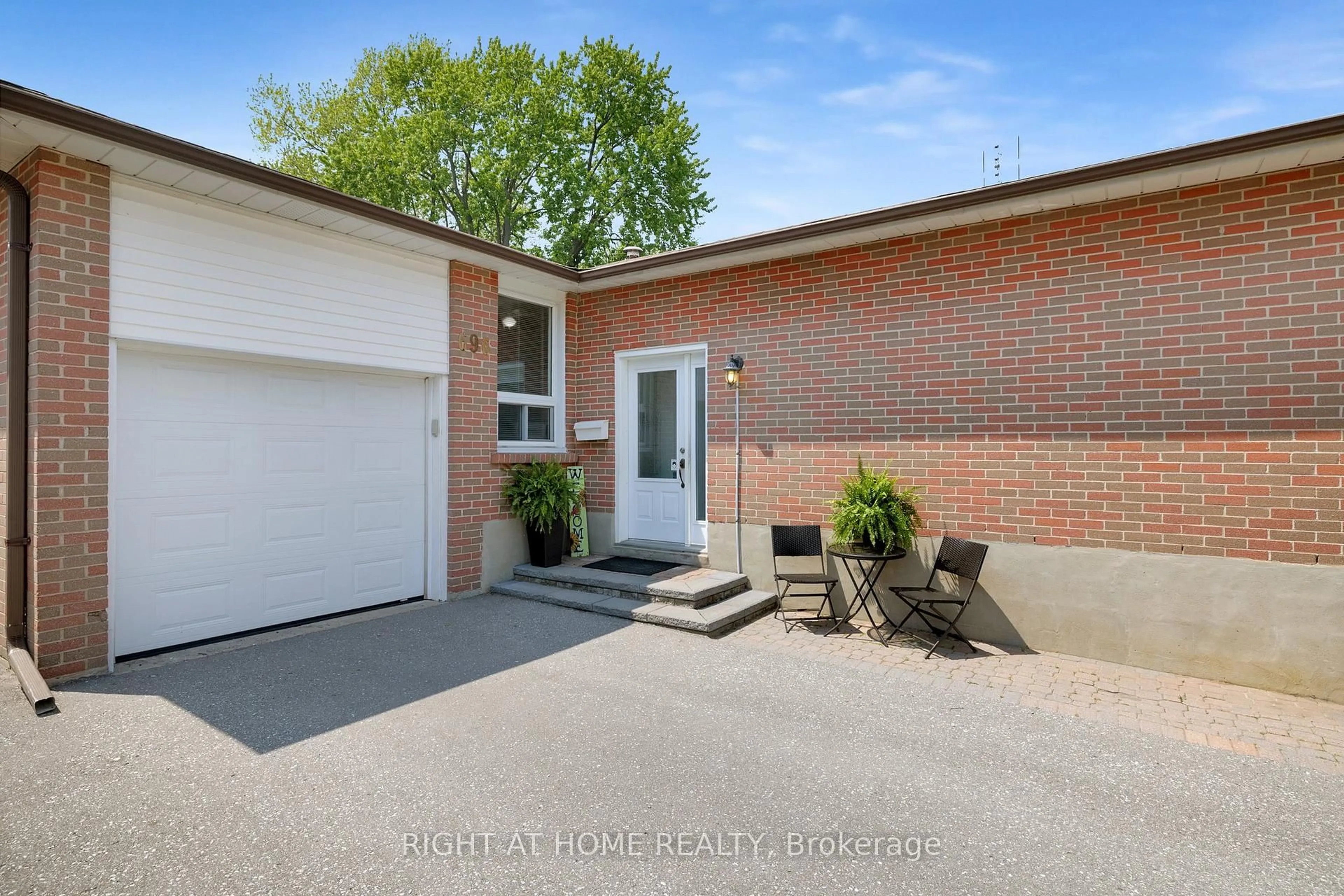 Home with brick exterior material, street for 696 Victory Dr, Pickering Ontario L1W 2S2
