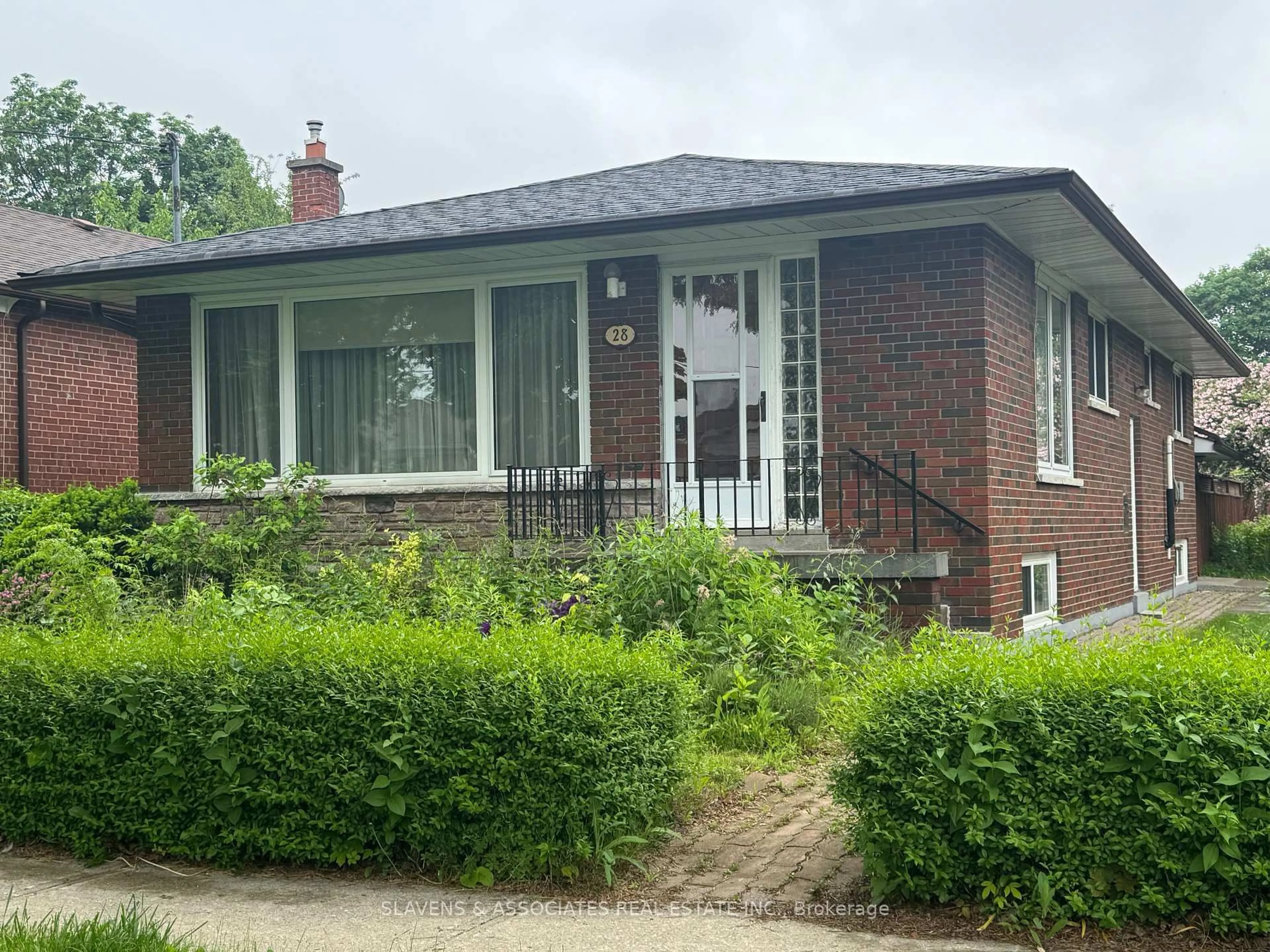 Home with brick exterior material, street for 28 Ashdean Dr, Toronto Ontario M1P 1E3