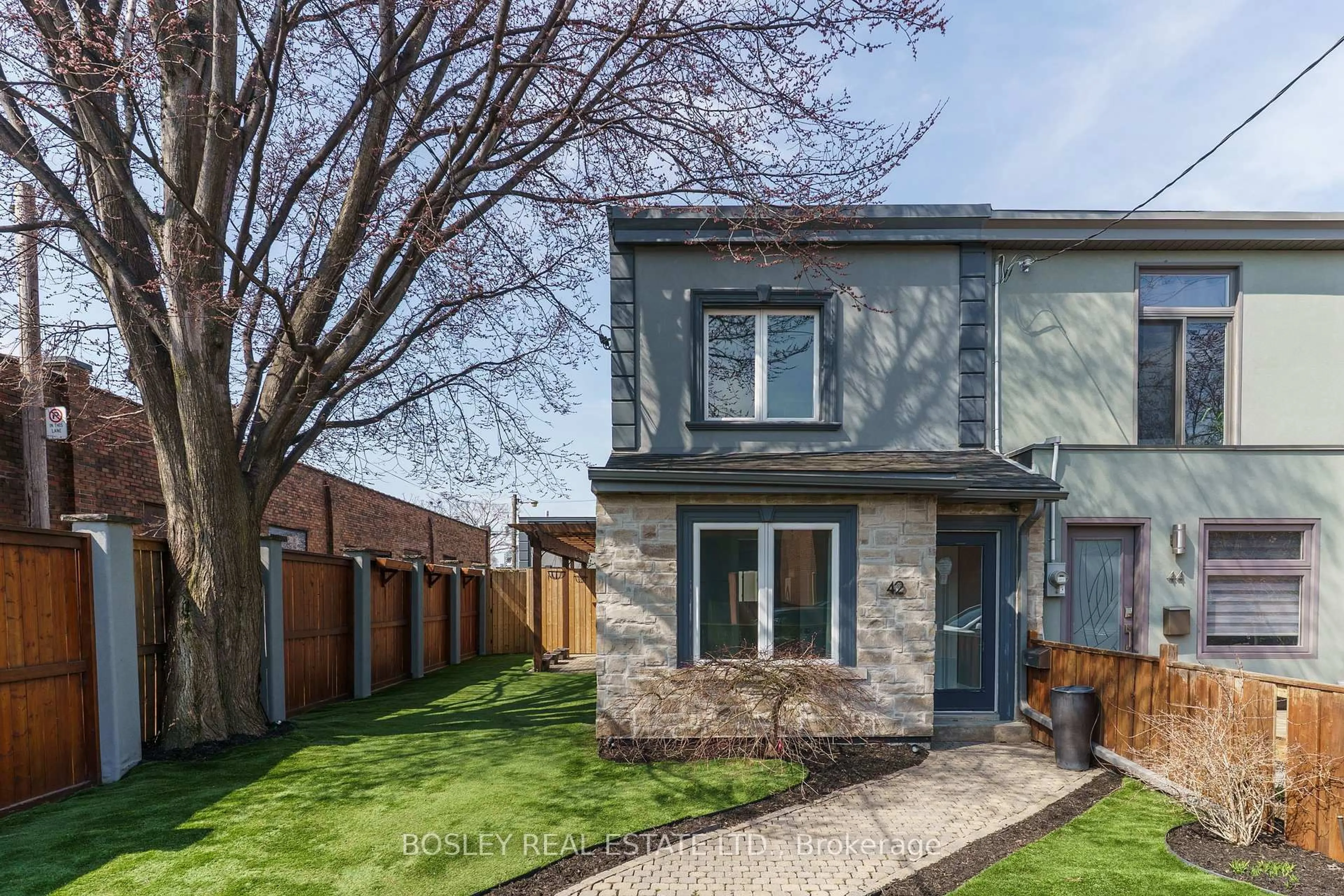Home with brick exterior material, street for 42 Logan Ave, Toronto Ontario M4M 2M8