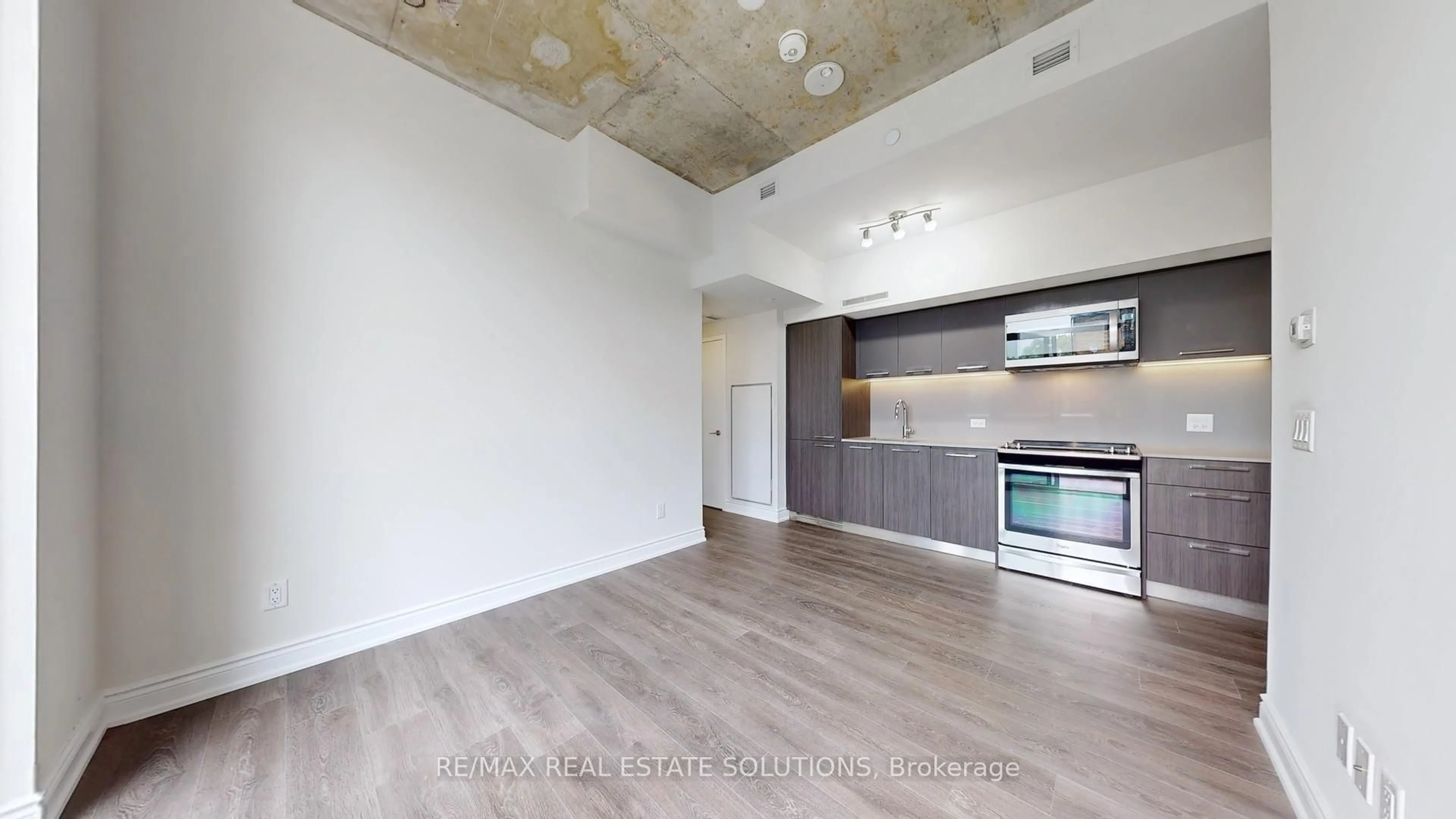 Open concept kitchen, unknown for 30 Baseball Pl #210, Toronto Ontario M4M 0E8