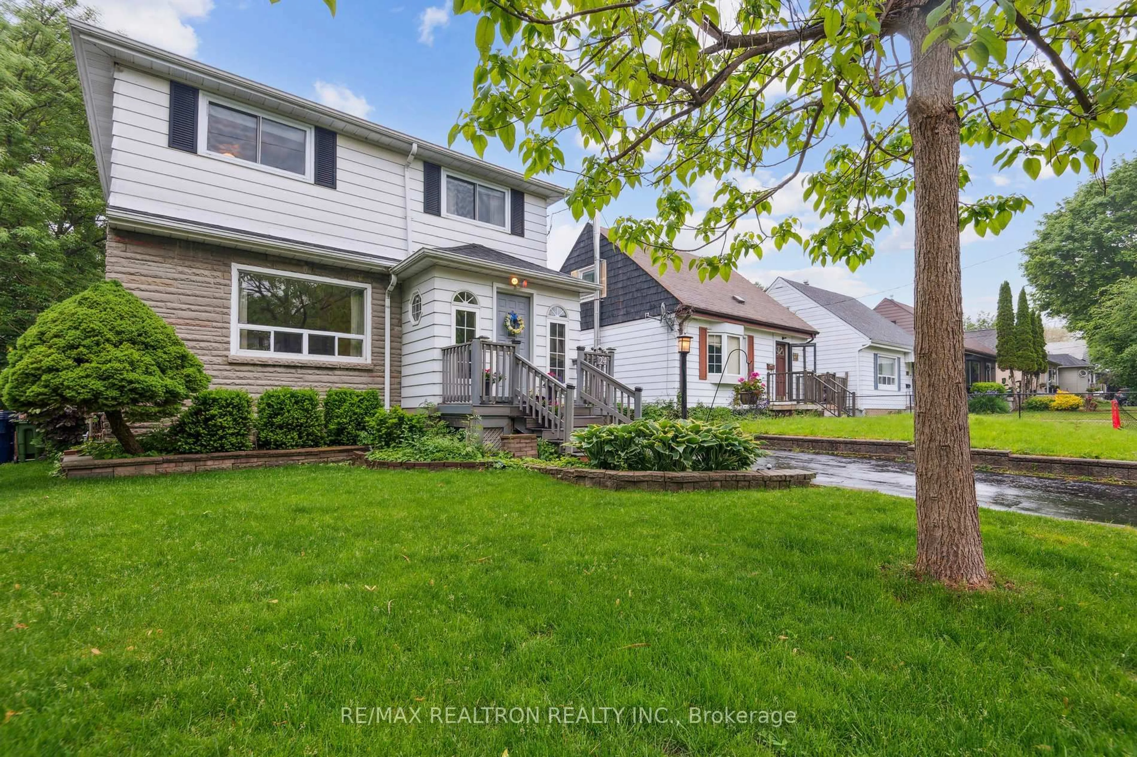 Home with vinyl exterior material, street for 24 Neilson Ave, Toronto Ontario M1M 2S2