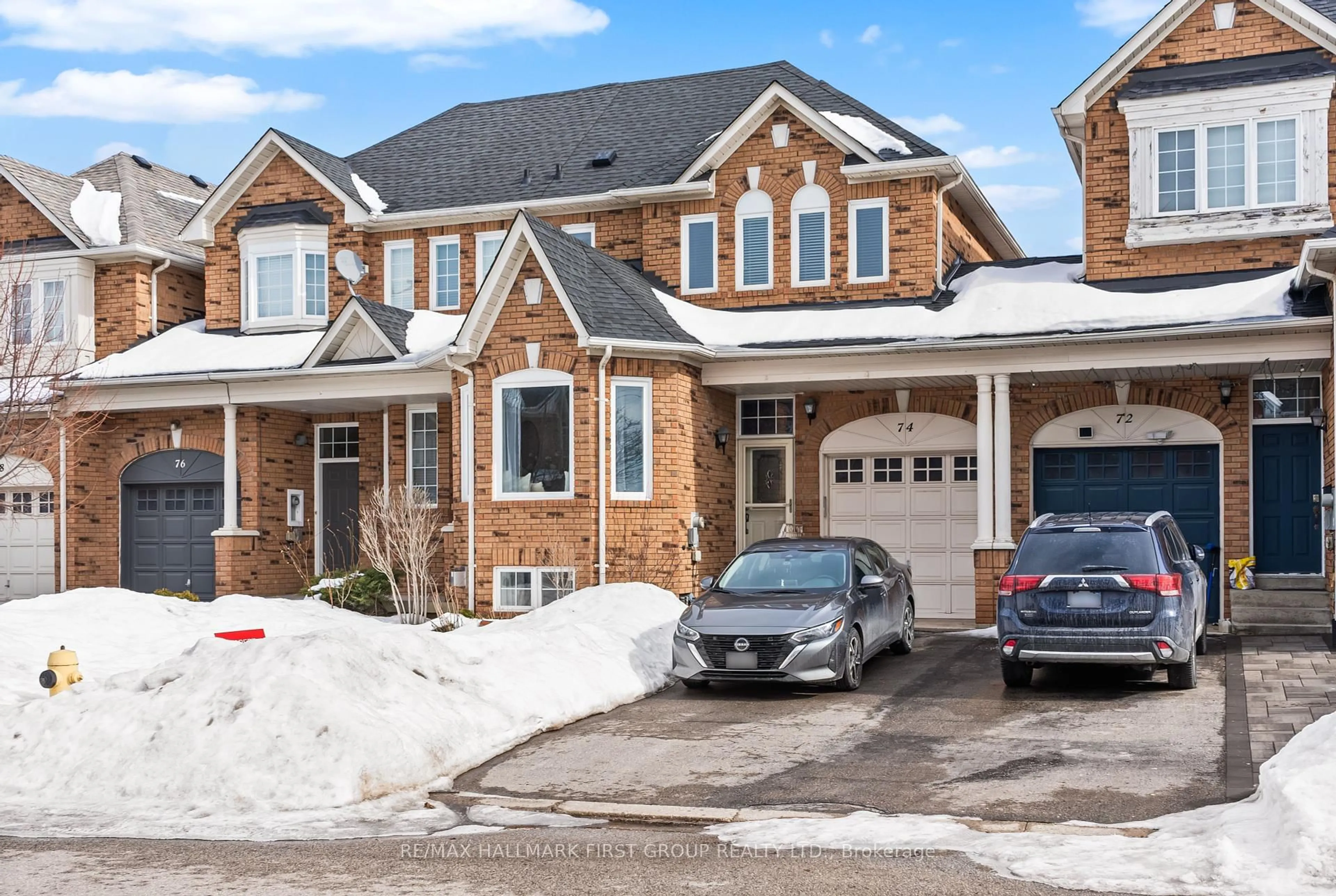 Home with brick exterior material, street for 74 Dooley Cres, Ajax Ontario L1T 4J2