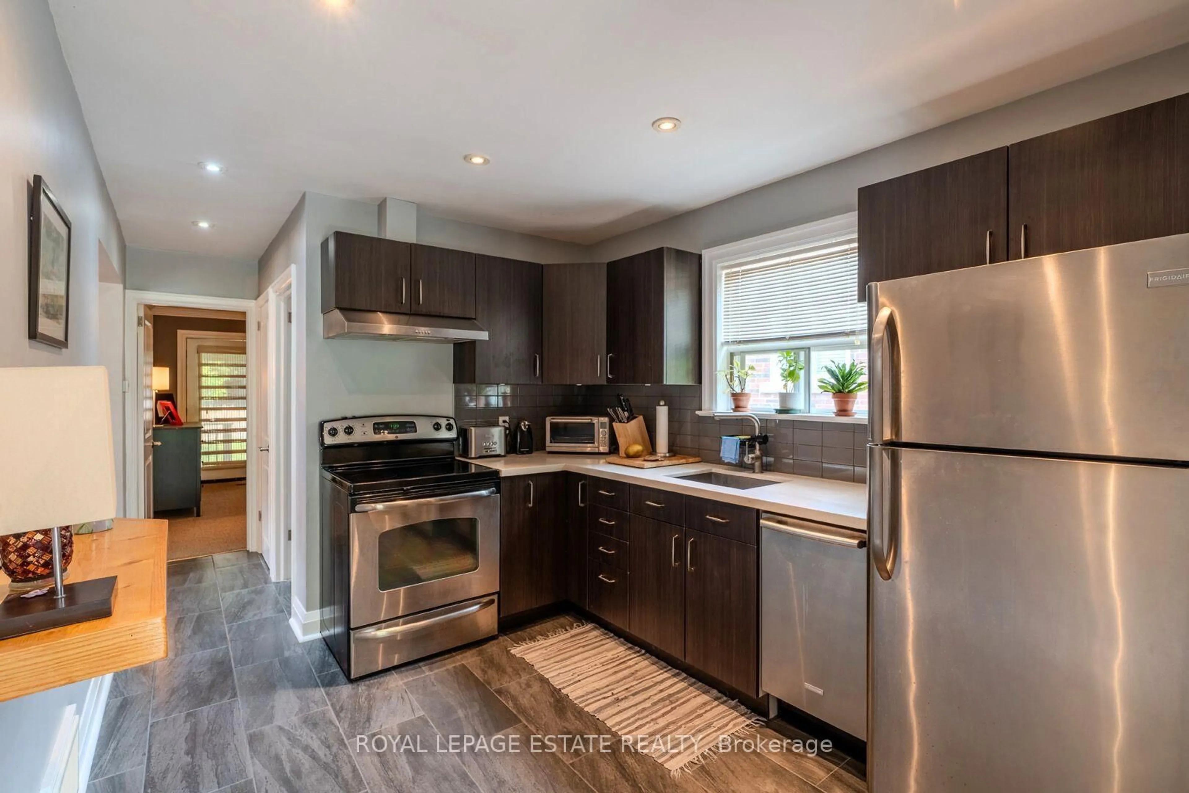 Open concept kitchen, wood/laminate floor for 210 Westview Blvd, Toronto Ontario M4B 3J5