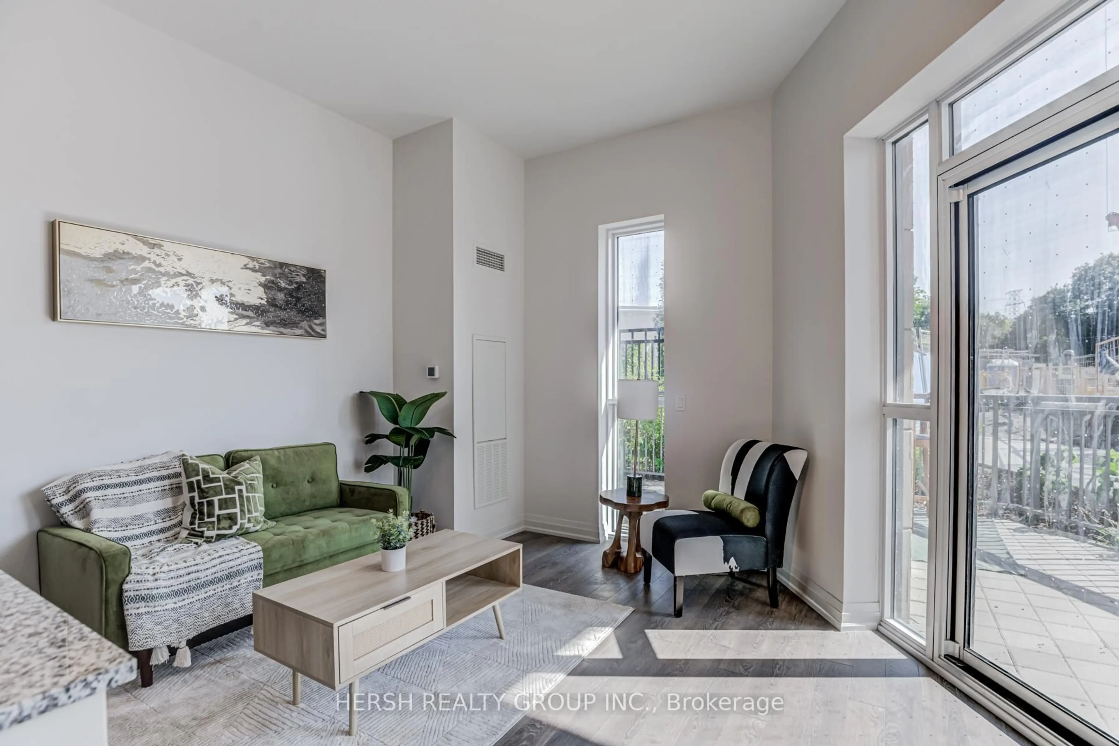 Living room with furniture, unknown for 10 Meadowglen Pl #106, Toronto Ontario M1G 0A8
