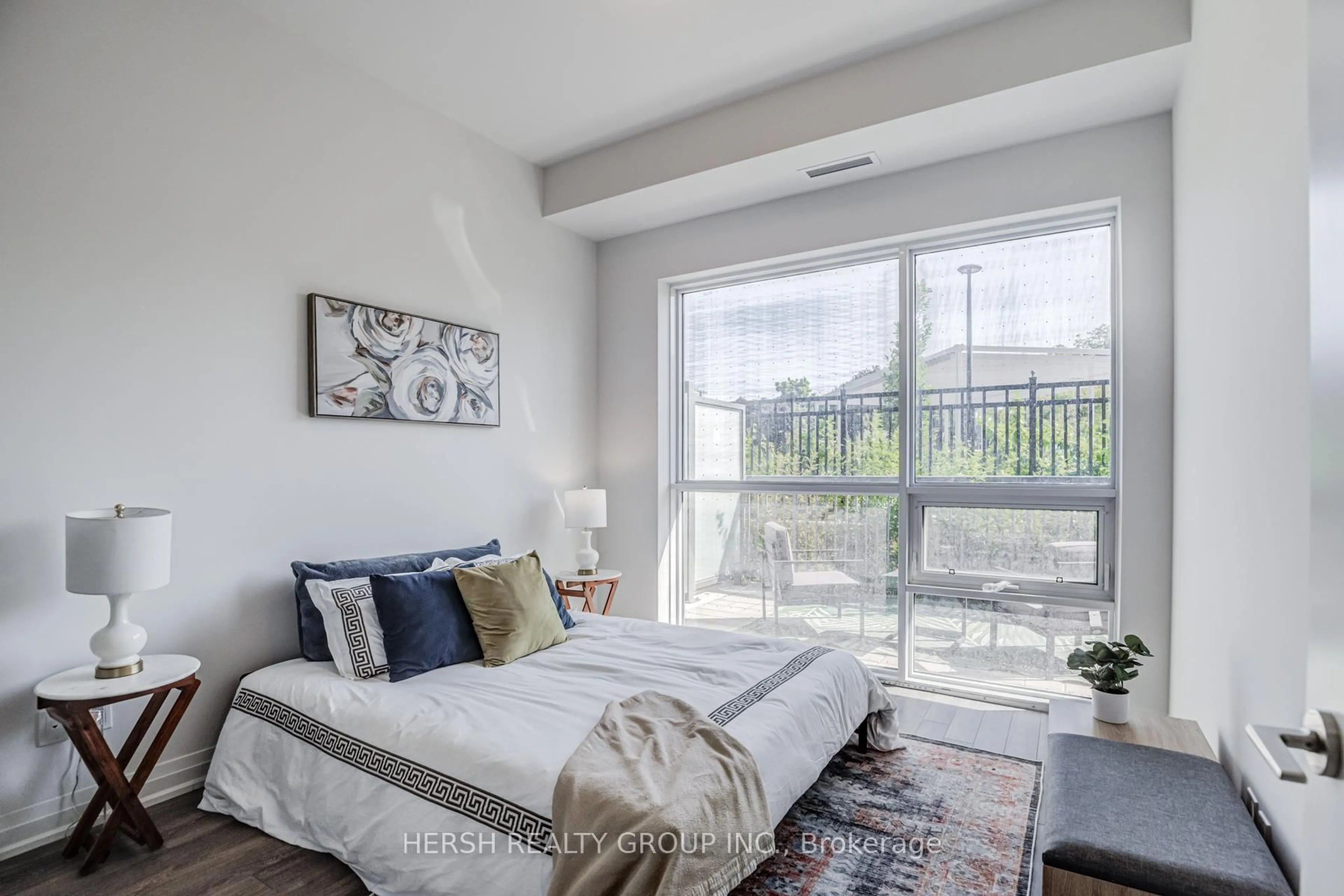 Bedroom with bed, unknown for 10 Meadowglen Pl #106, Toronto Ontario M1G 0A8