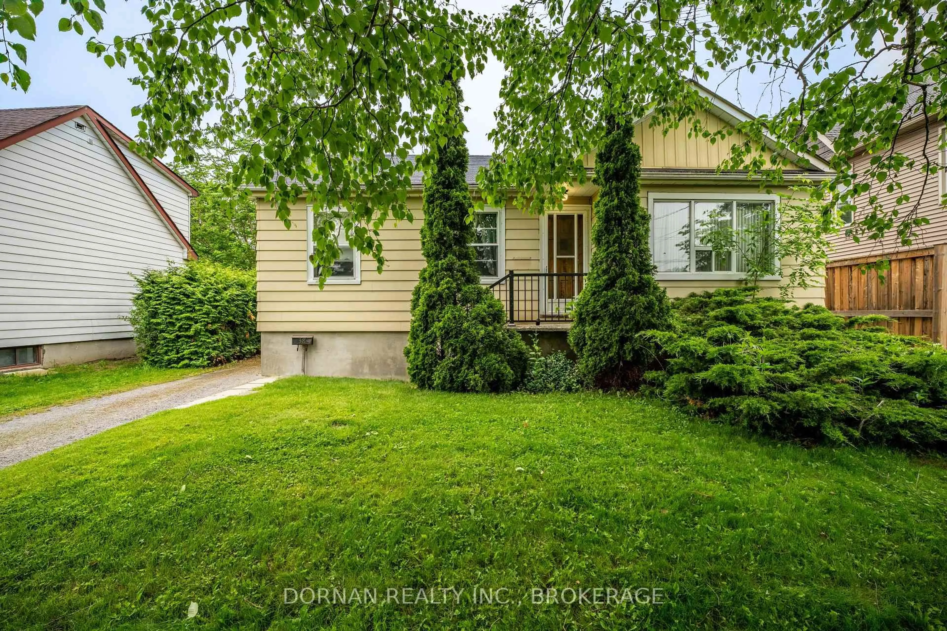 Home with vinyl exterior material, street for 38 Darlington Blvd, Clarington Ontario L1E 2J7