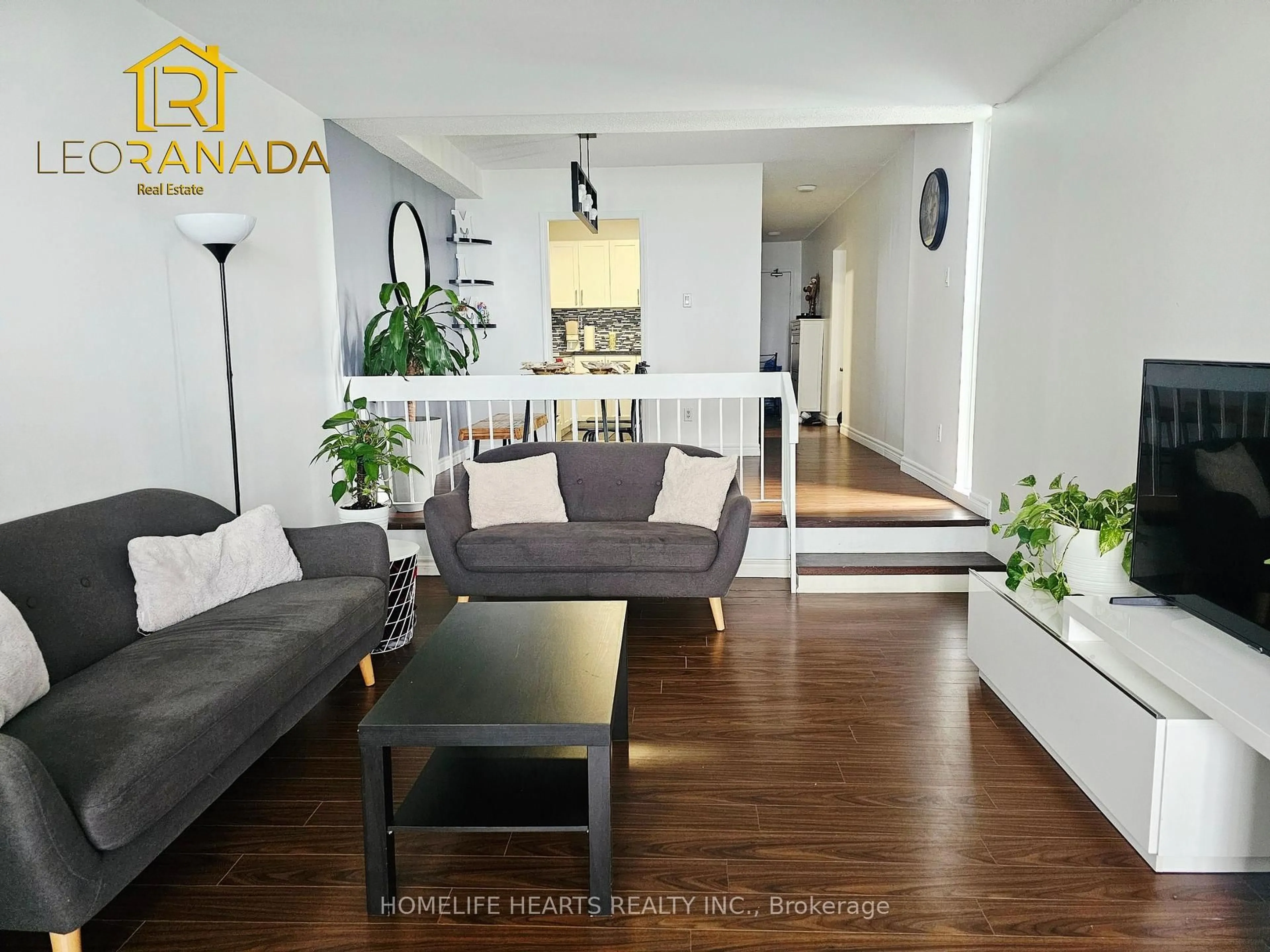 Living room with furniture, wood/laminate floor for 4101 Sheppard Ave #1005, Toronto Ontario M1S 3H3