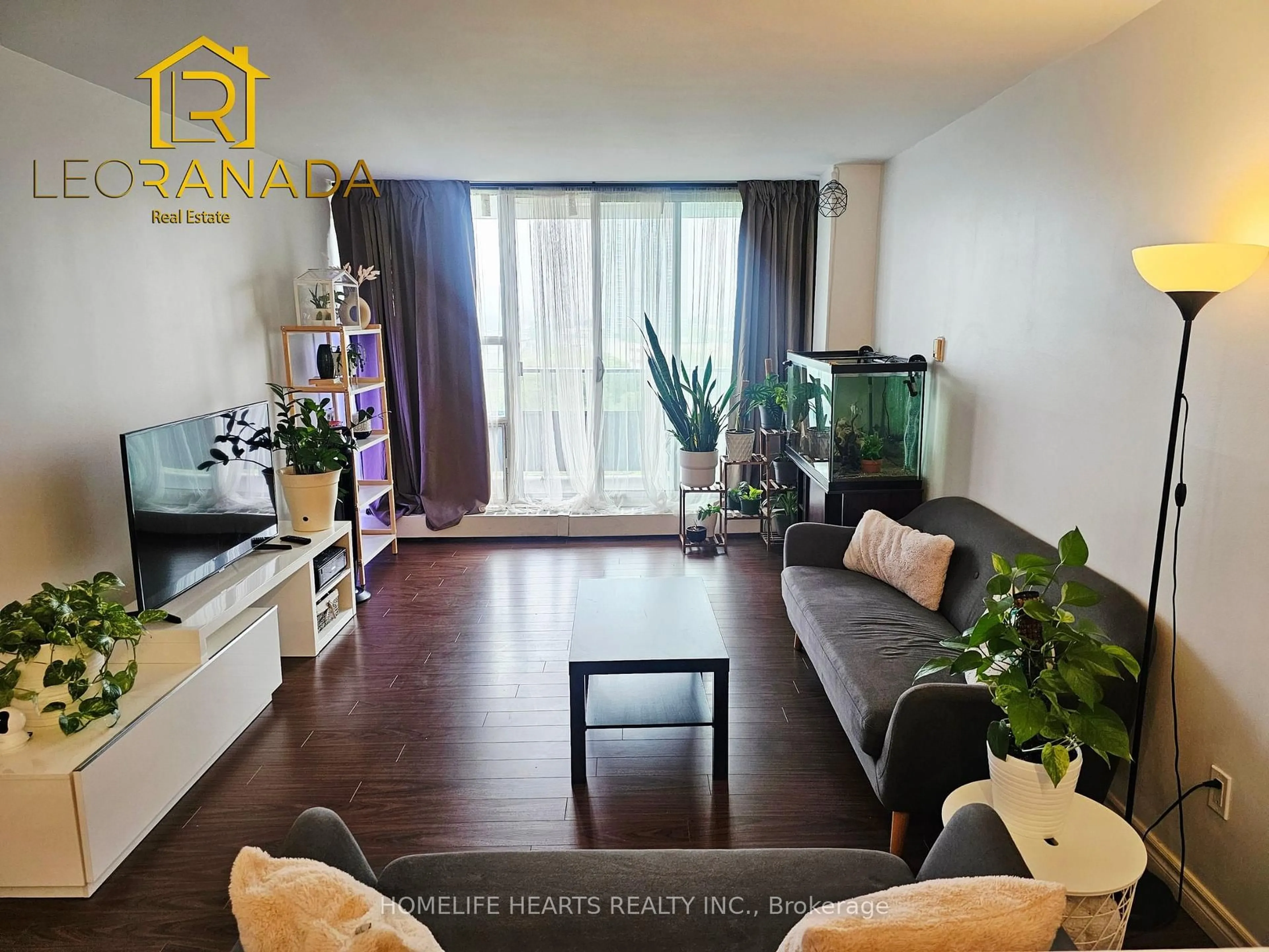 Living room with furniture, wood/laminate floor for 4101 Sheppard Ave #1005, Toronto Ontario M1S 3H3