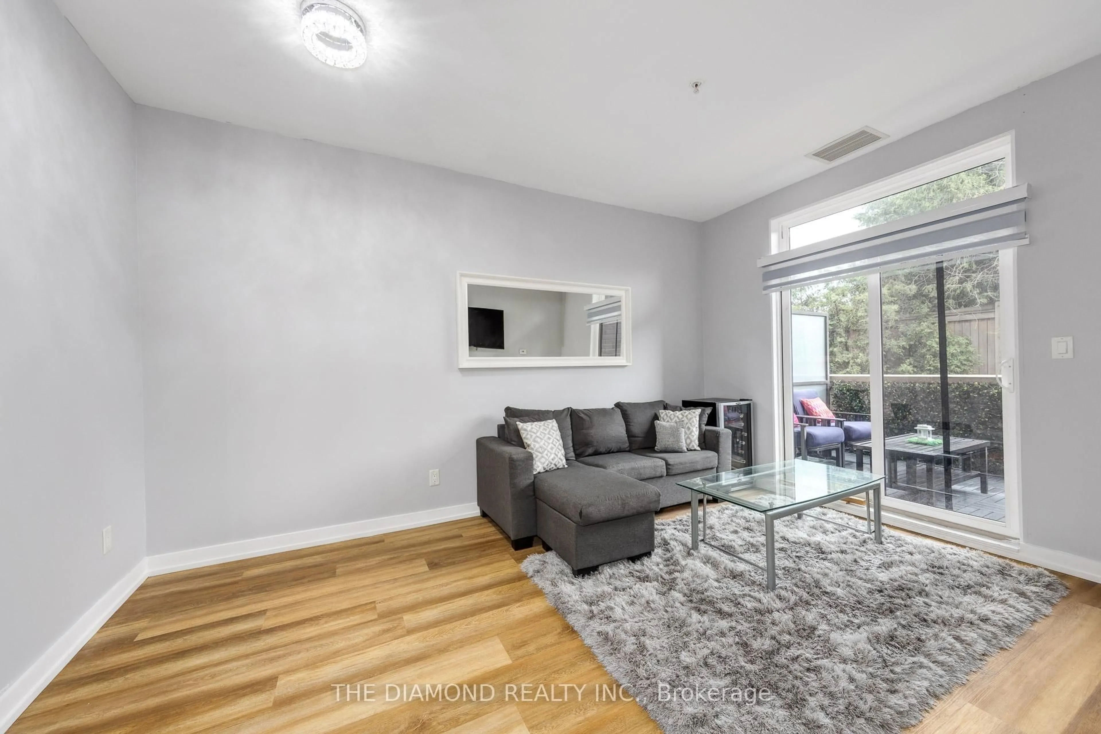 Living room with furniture, unknown for 3560 St Clair Ave #107, Toronto Ontario M1K 0A9