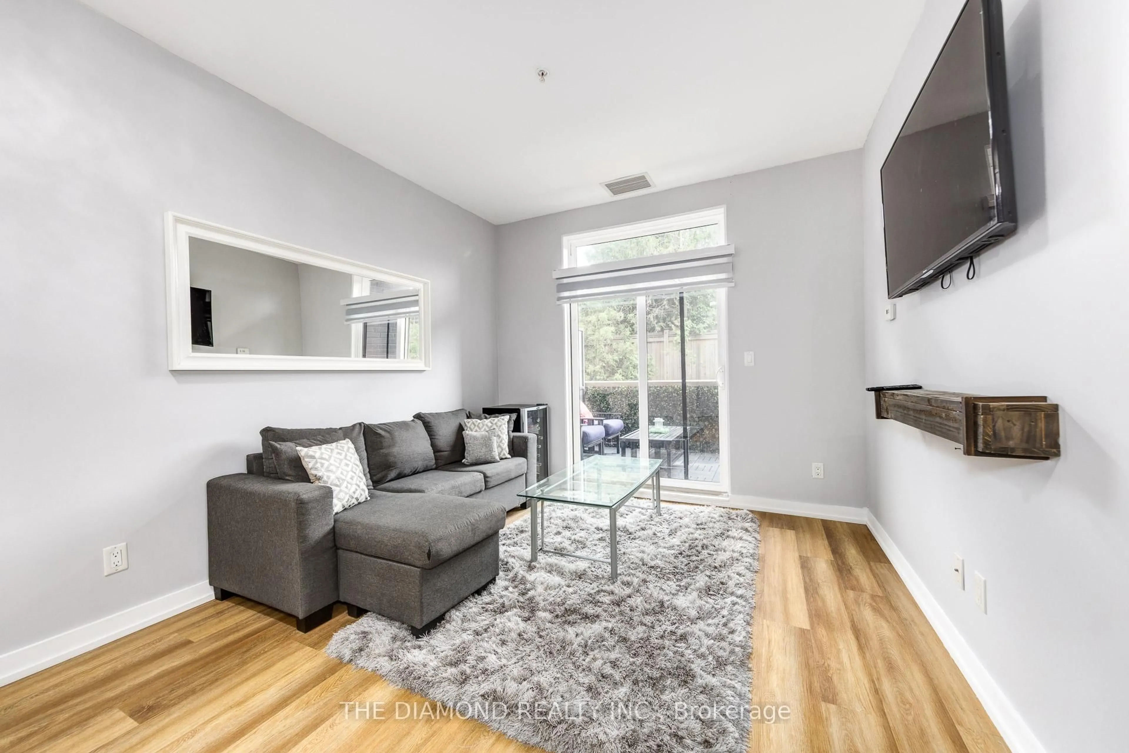 Living room with furniture, unknown for 3560 St Clair Ave #107, Toronto Ontario M1K 0A9