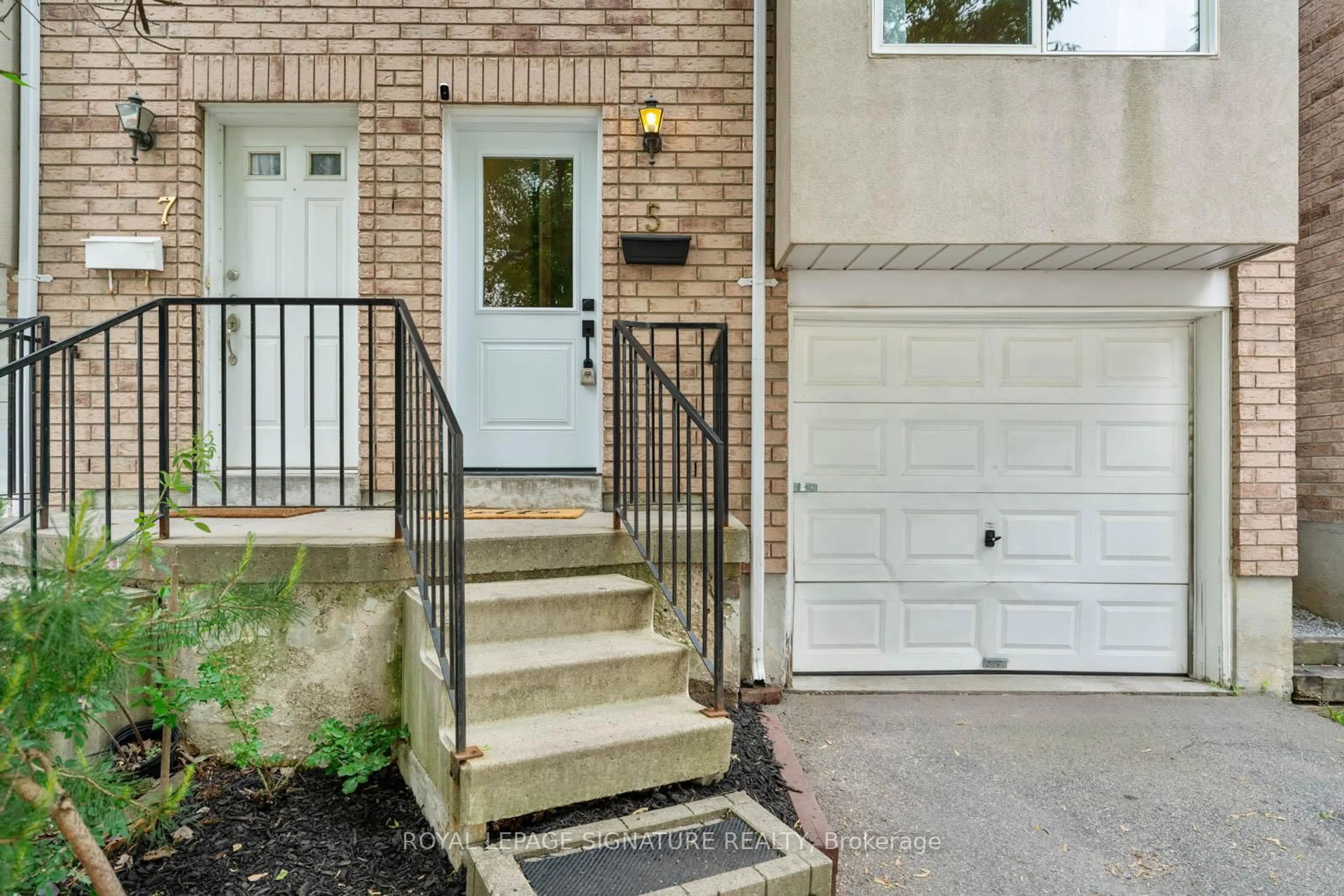 Home with brick exterior material, street for 5 Ice Cream Lane, Toronto Ontario M4C 5T1