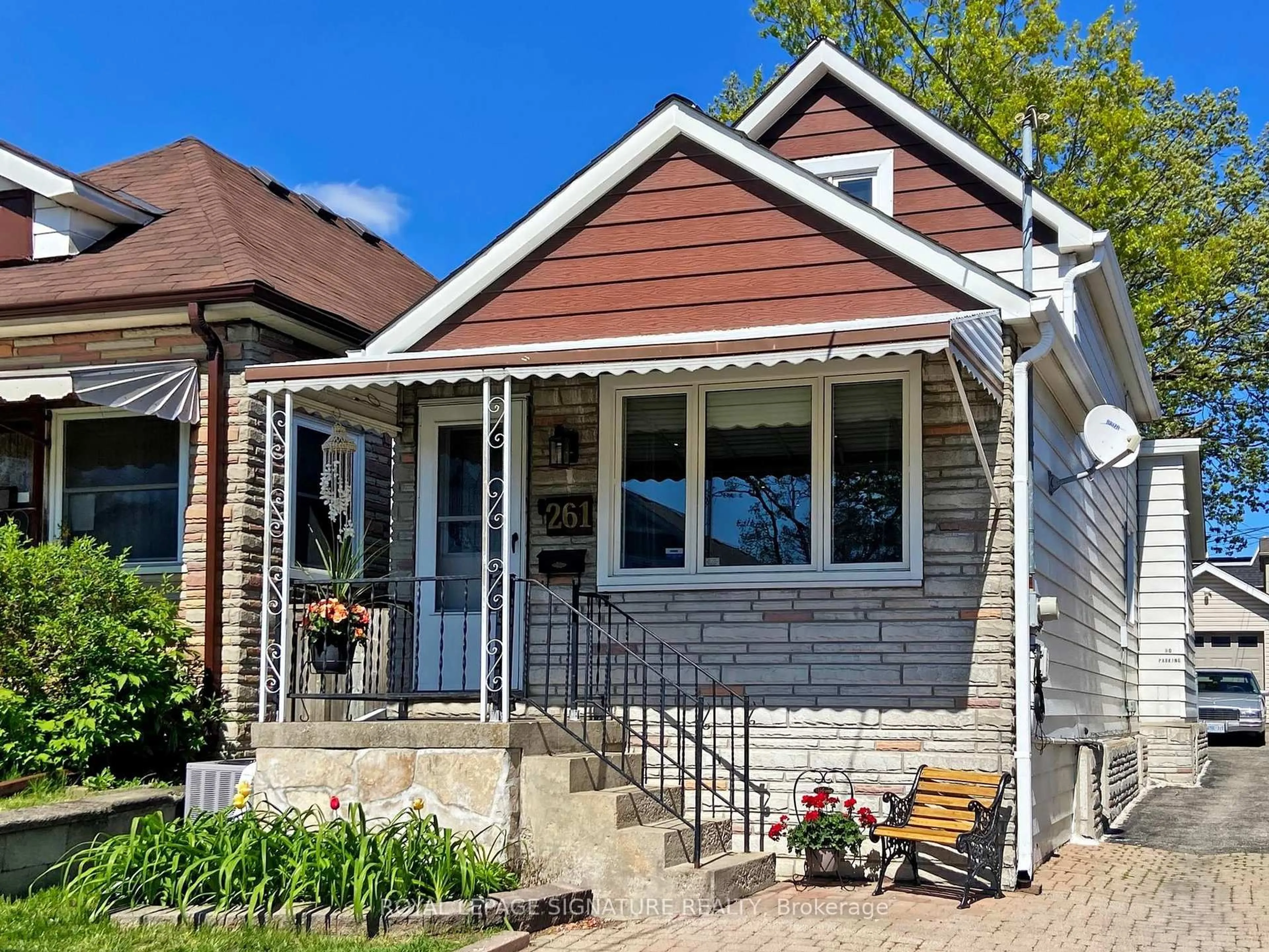 Home with brick exterior material, street for 261 Glebemount Ave, Toronto Ontario M4C 3T7