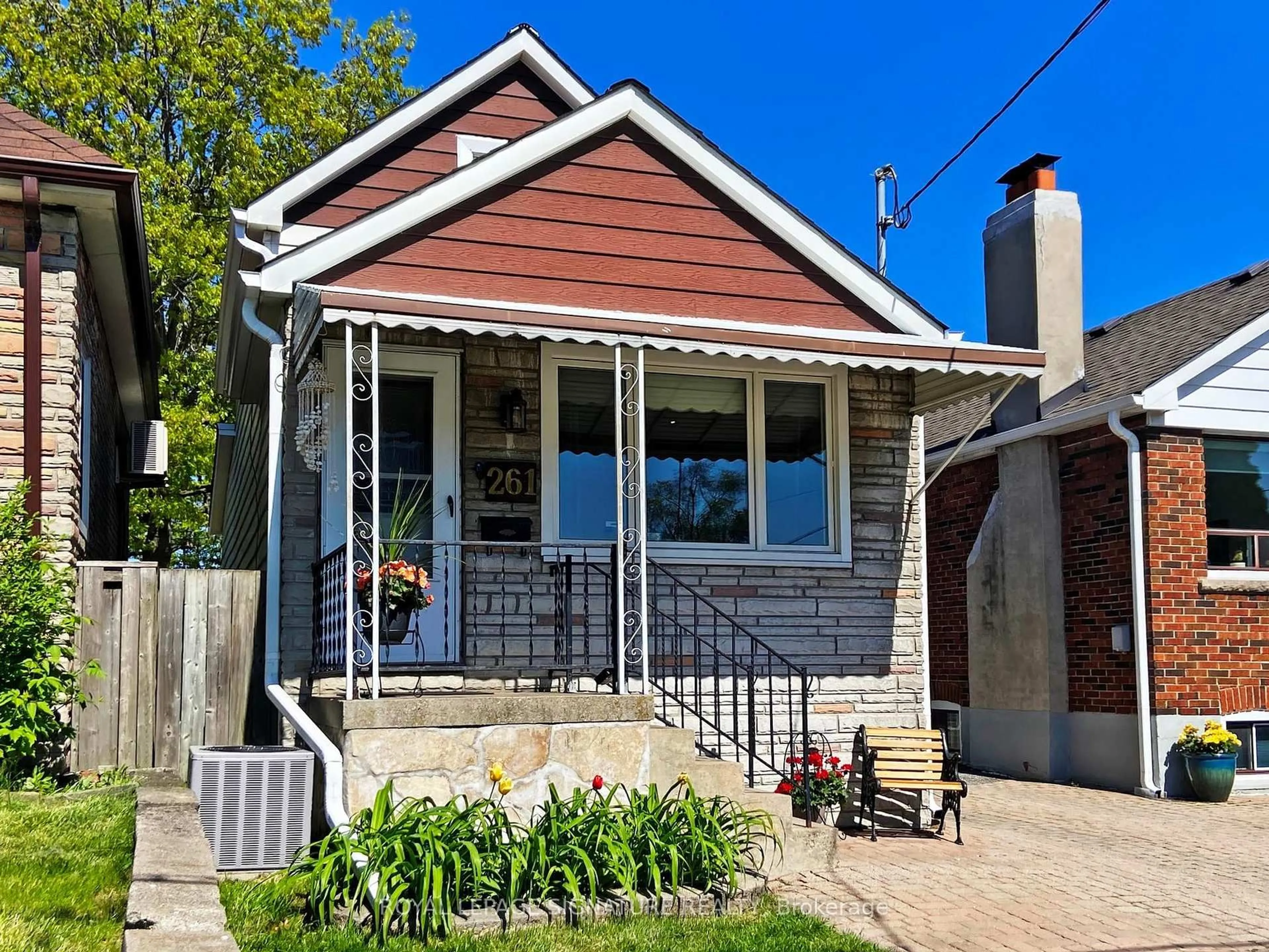 Home with brick exterior material, street for 261 Glebemount Ave, Toronto Ontario M4C 3T7