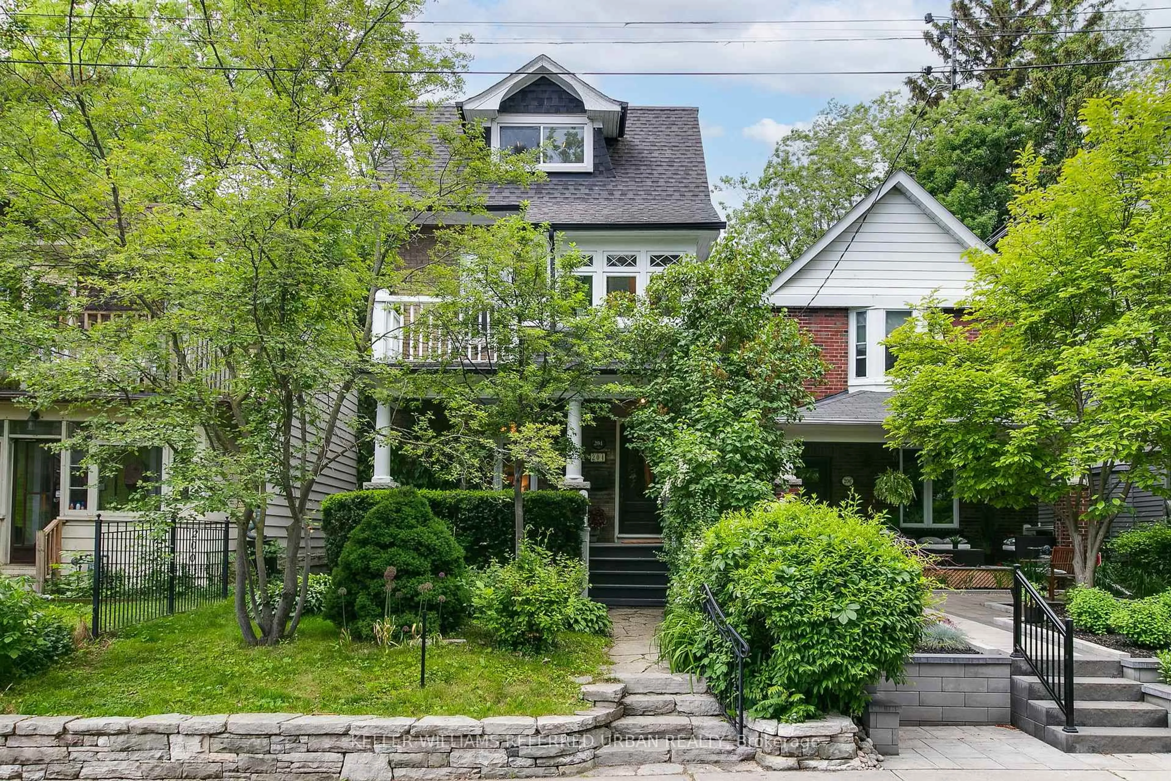 Home with brick exterior material, street for 204 Ashdale Ave, Toronto Ontario M4L 2Y9