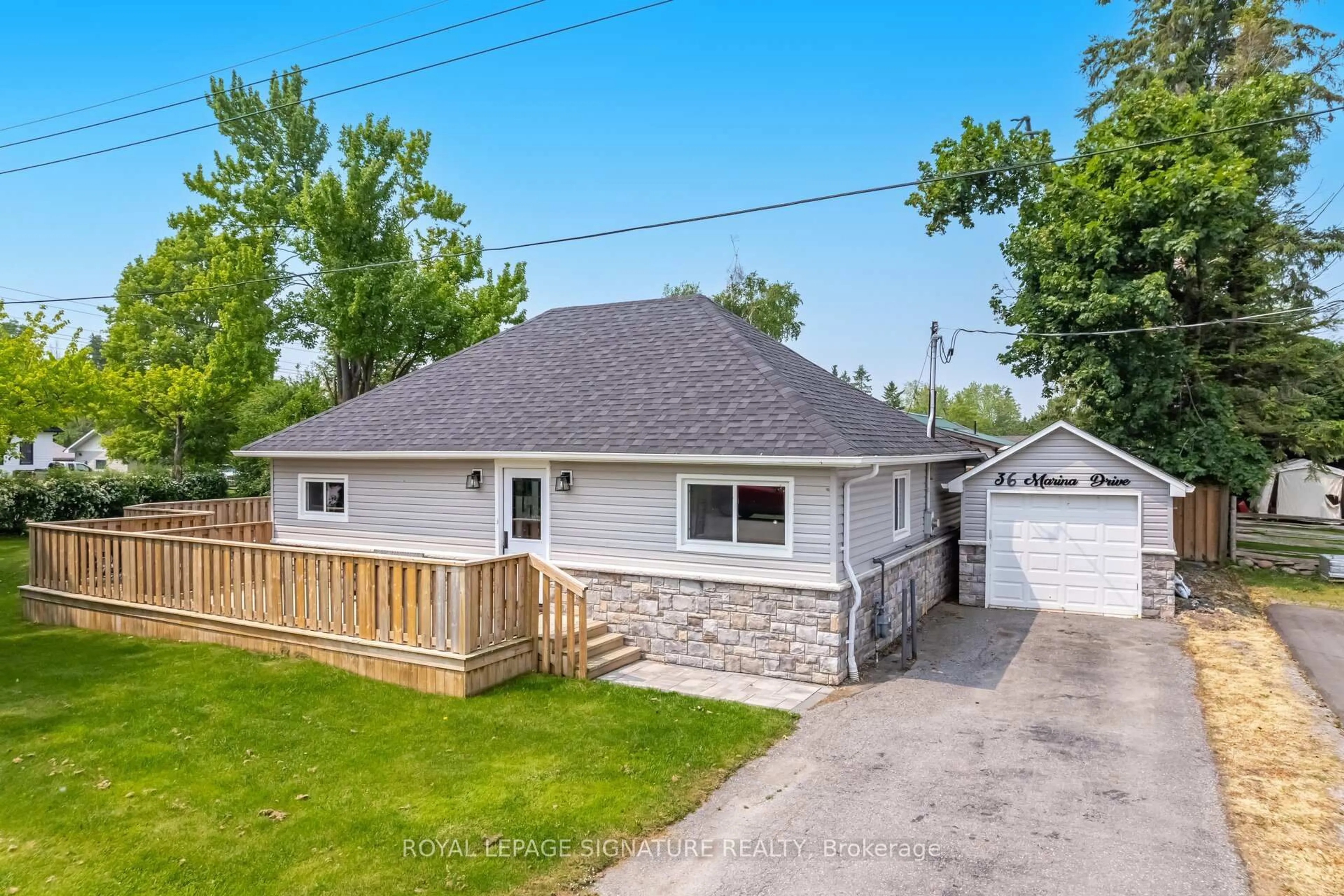 A pic from outside/outdoor area/front of a property/back of a property/a pic from drone, street for 36 Marina Dr, Scugog Ontario L0B 1E0