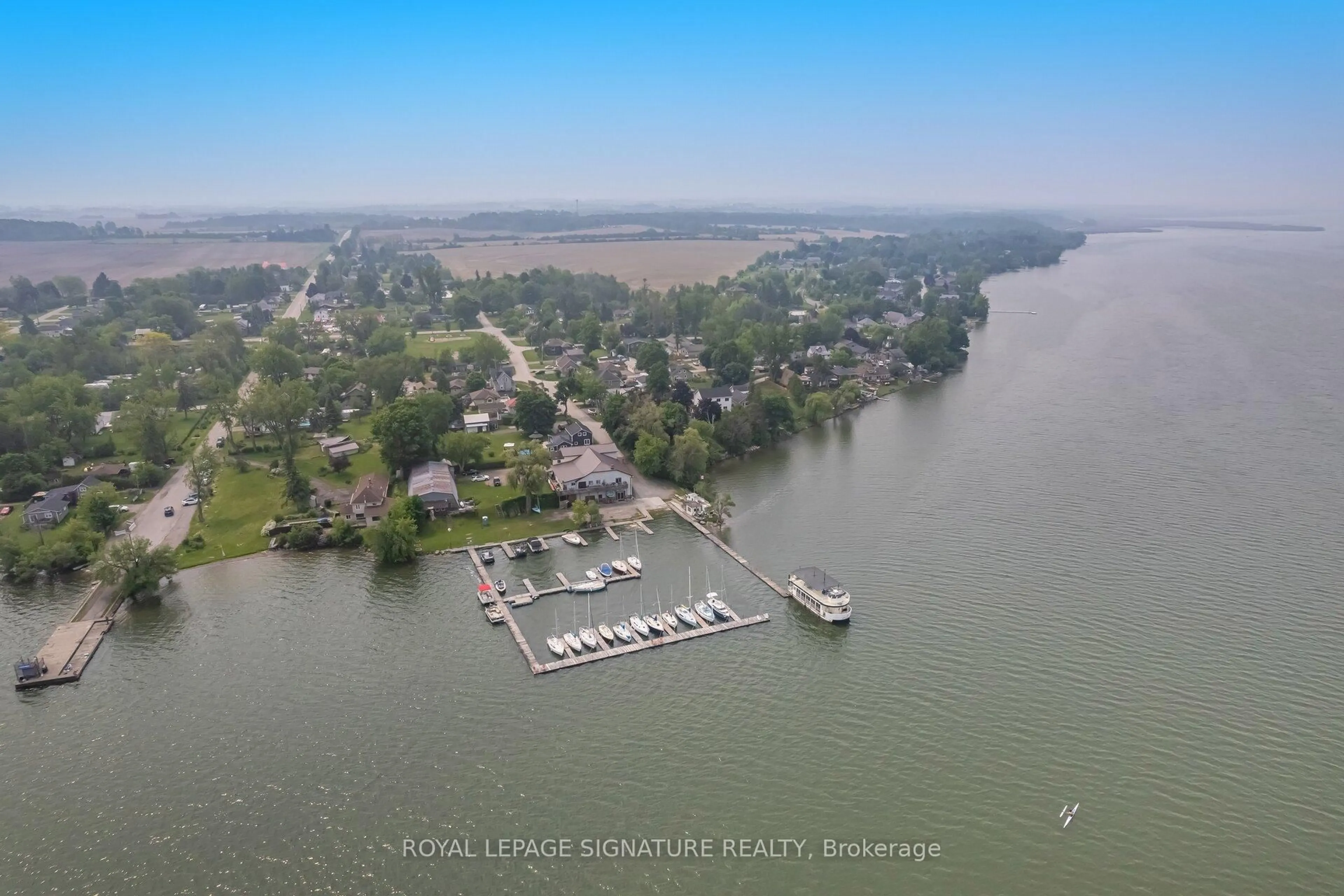 A pic from outside/outdoor area/front of a property/back of a property/a pic from drone, water/lake/river/ocean view for 36 Marina Dr, Scugog Ontario L0B 1E0
