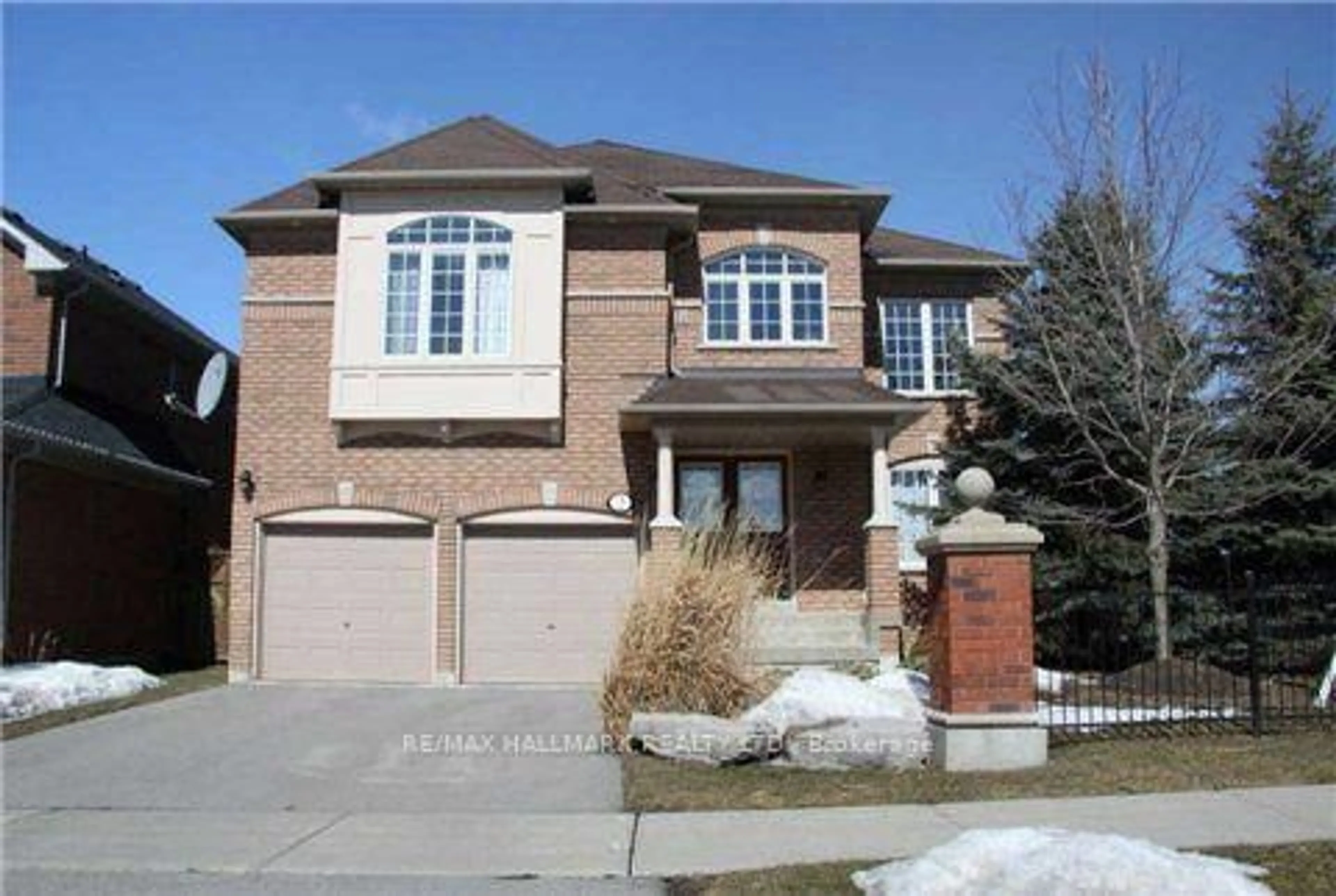 Home with brick exterior material, street for 2 Twin Streams Rd, Whitby Ontario L1P 1P1