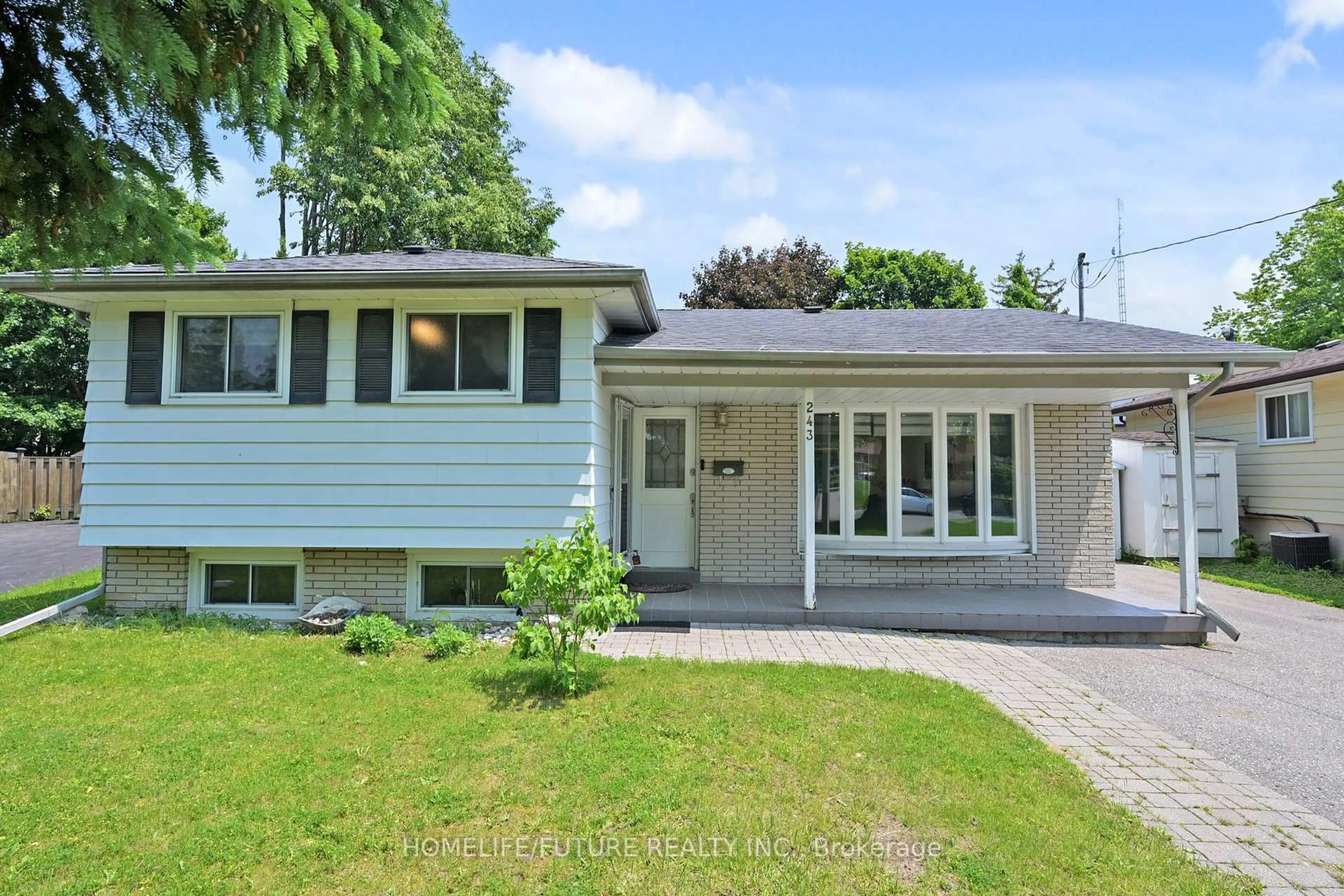 Home with vinyl exterior material, street for 243 Acadia Dr, Oshawa Ontario L1G 1X9