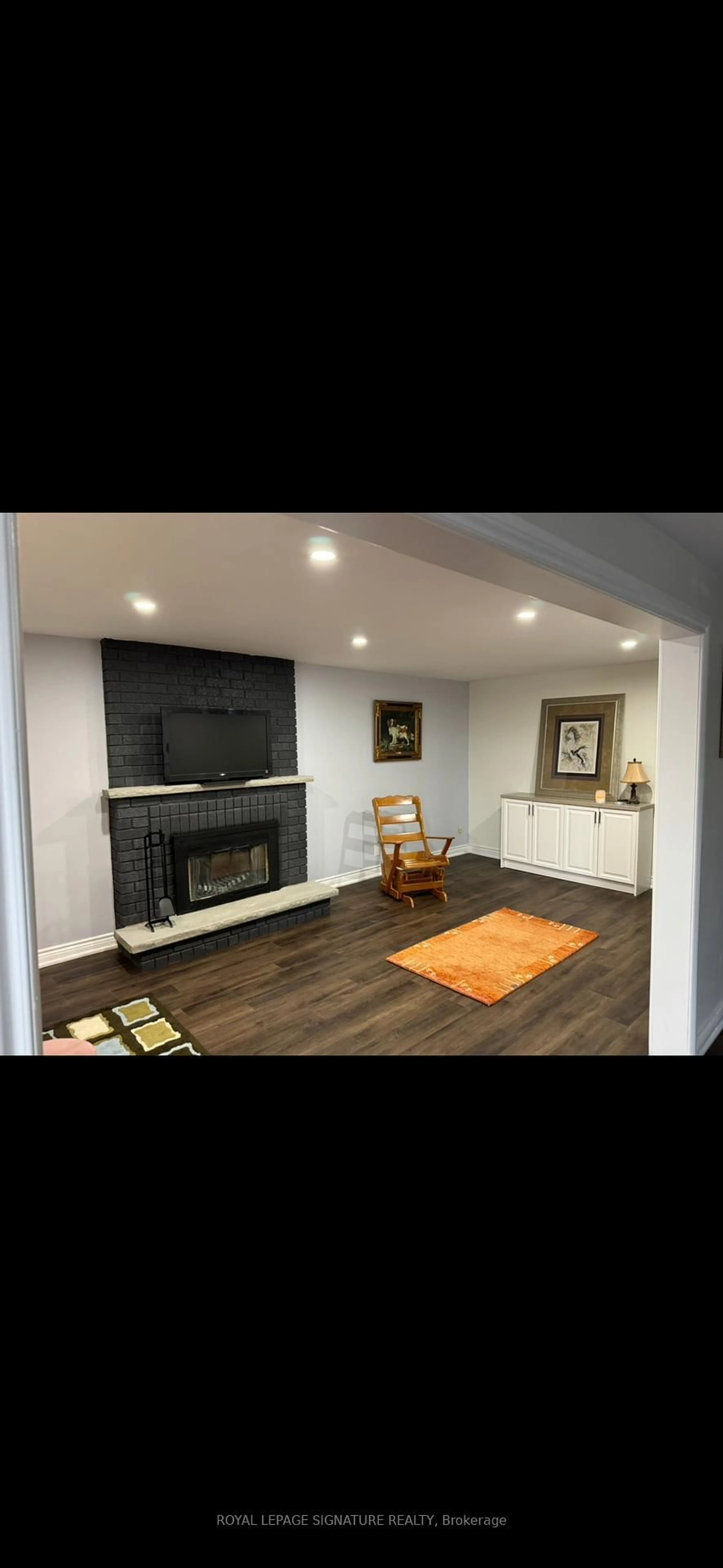 Living room with furniture, wood/laminate floor for 1813 Spruce hill Rd, Pickering Ontario L1V 1S5