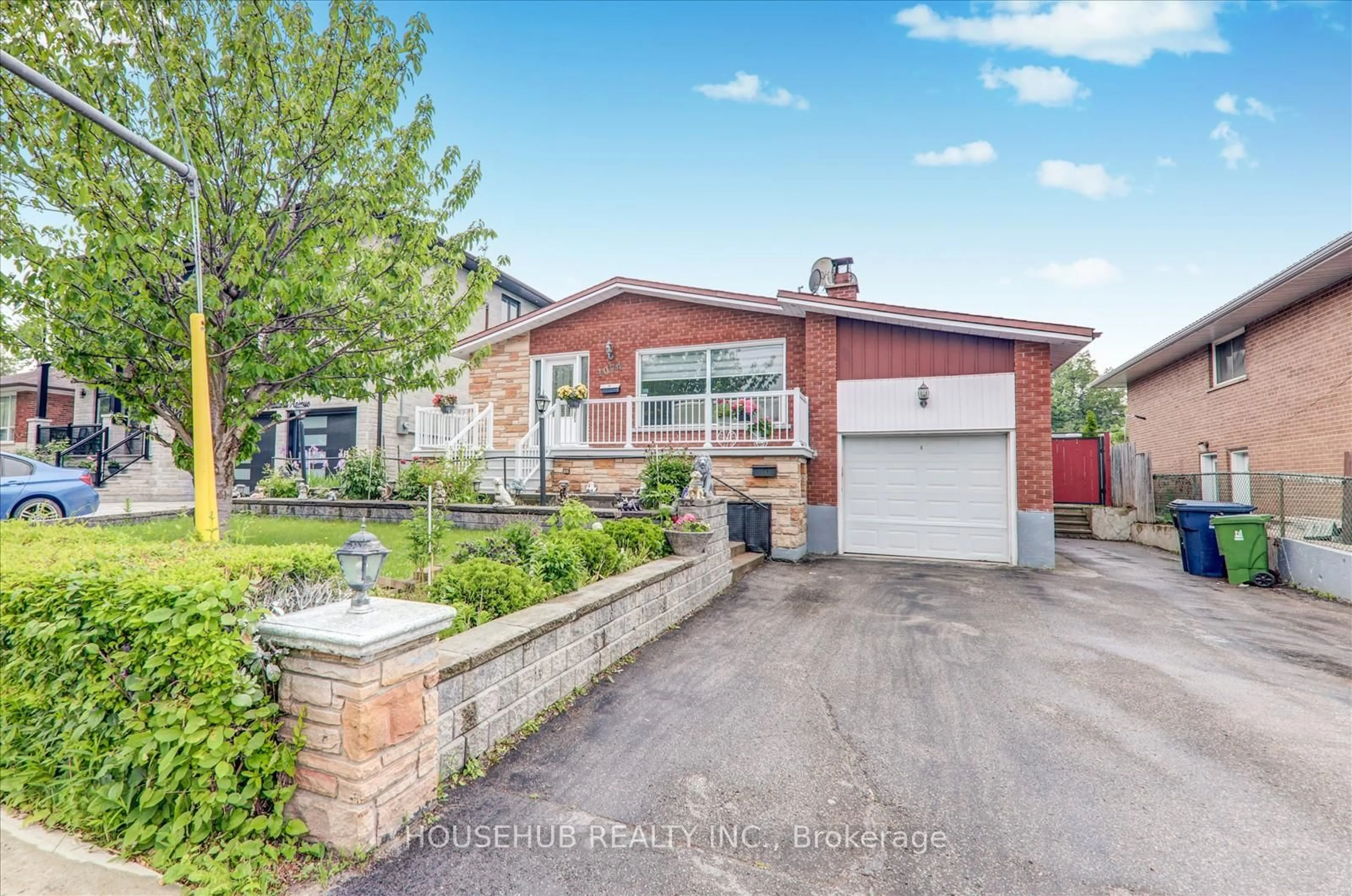 Home with brick exterior material, street for 1074 Midland Ave, Toronto Ontario M1K 4G9