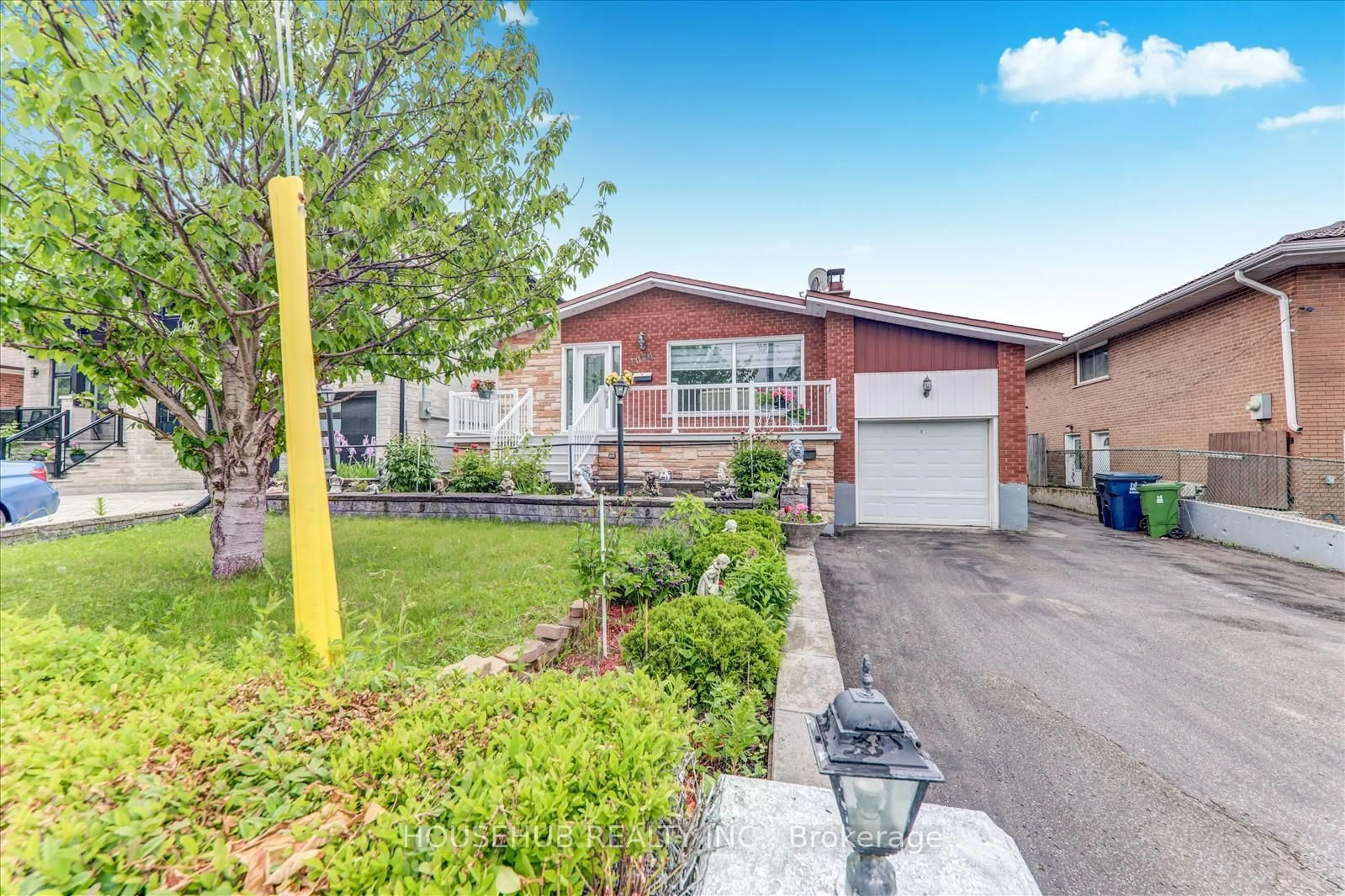 Home with brick exterior material, street for 1074 Midland Ave, Toronto Ontario M1K 4G9