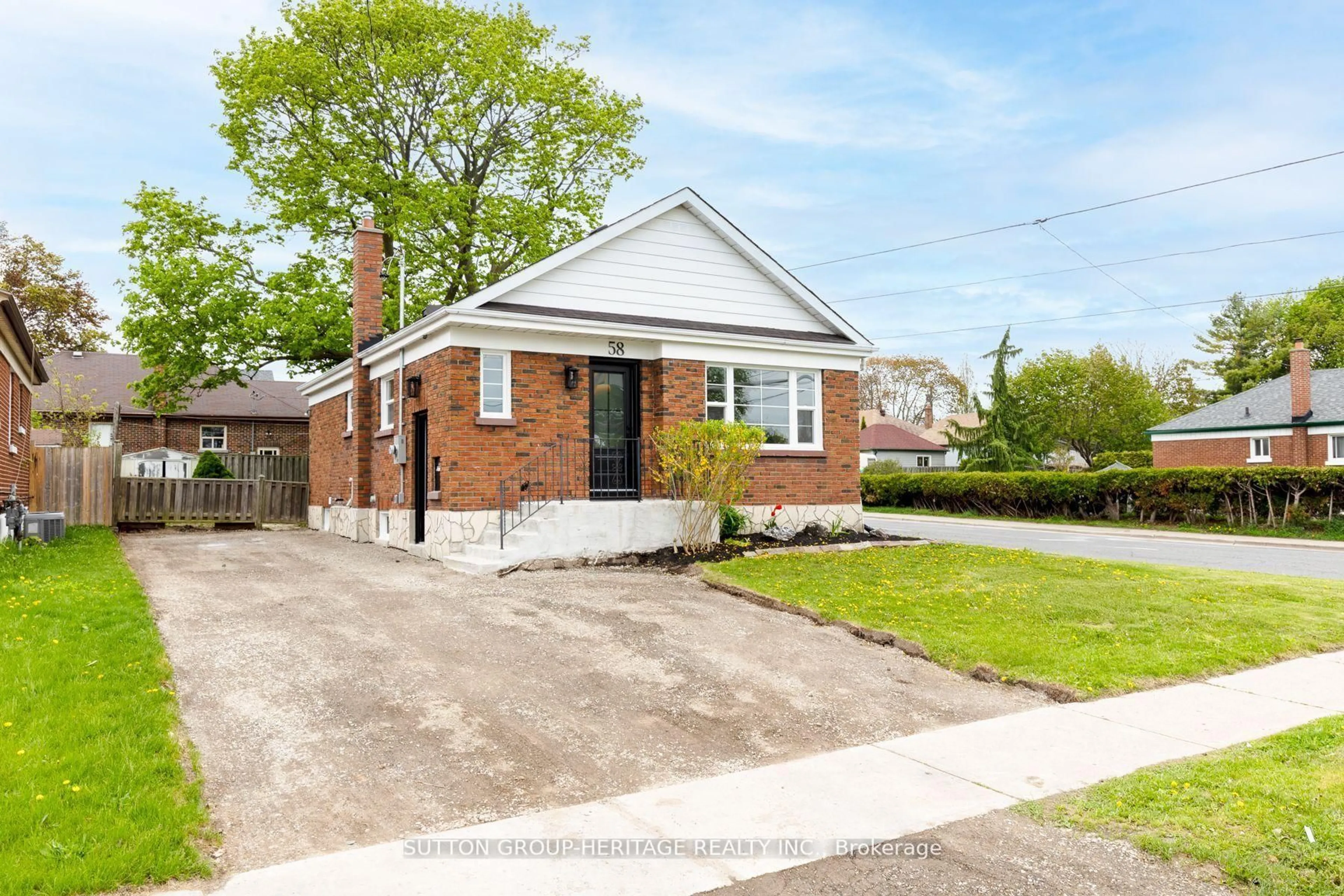 Home with brick exterior material, street for 58 Wilson Rd, Oshawa Ontario L1G 6C8