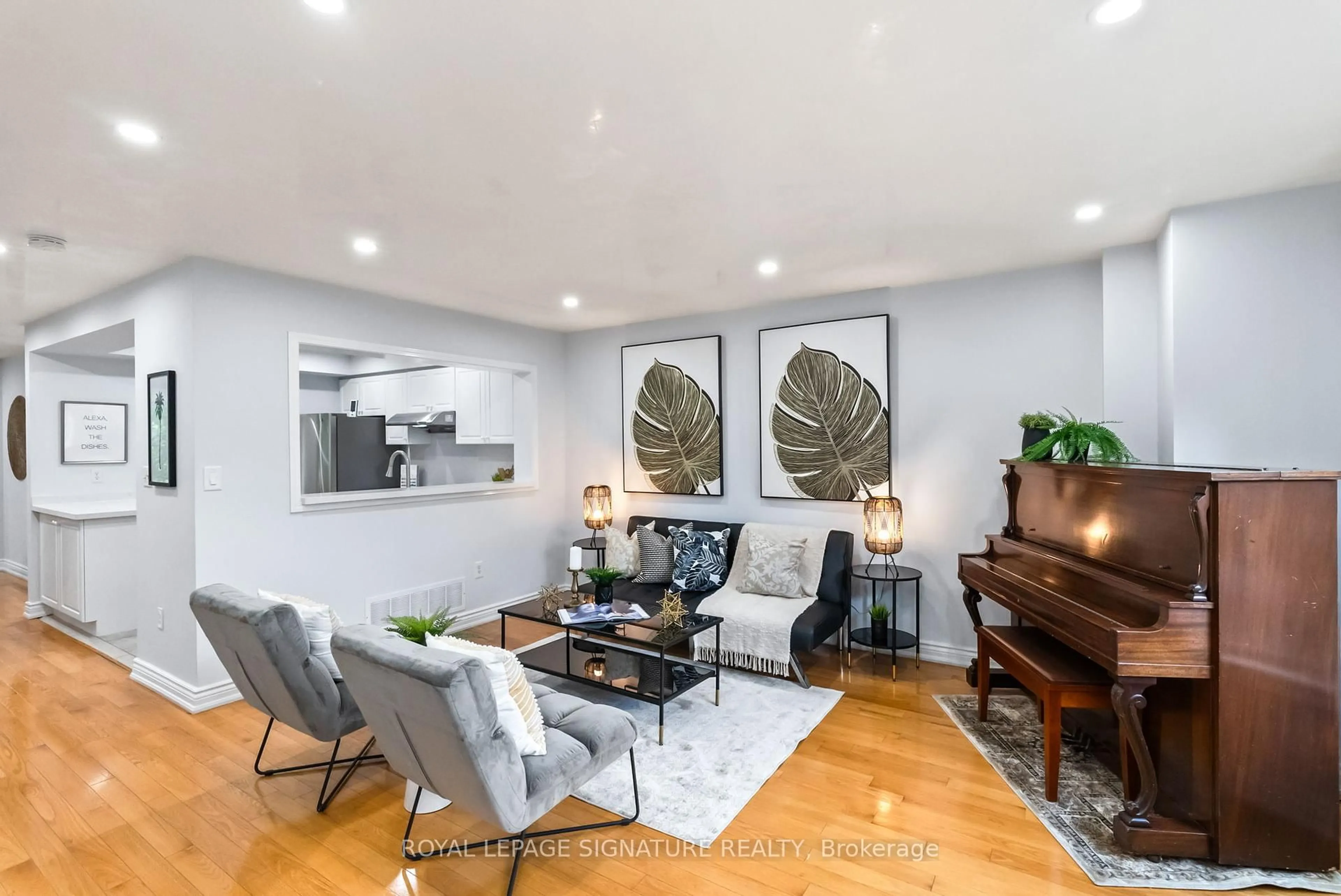 Living room with furniture, wood/laminate floor for 28 Georgina Gate, Toronto Ontario M1L 4T9